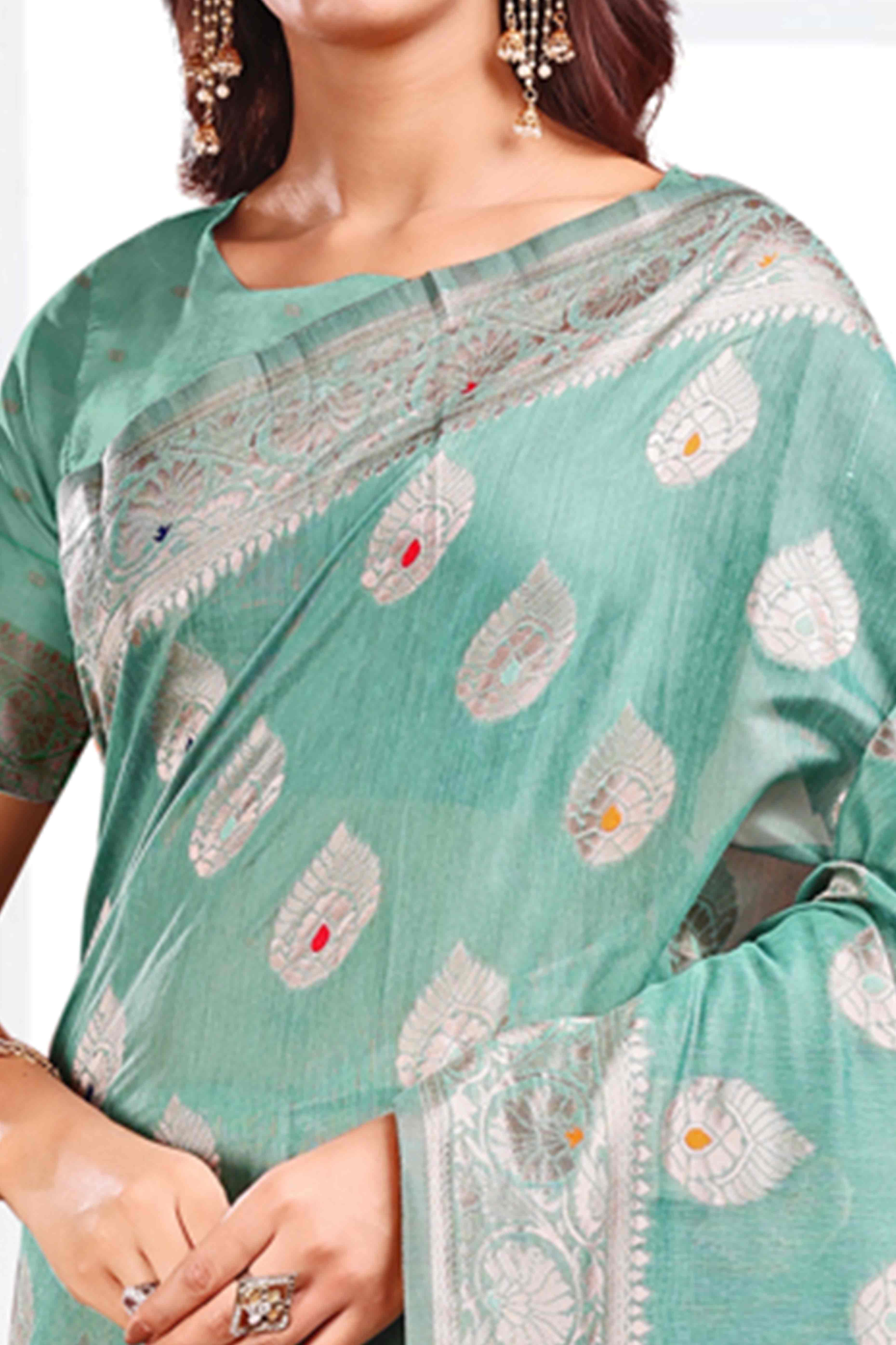 Turquoise Linen Cotton Silk Saree Adorned With Intricate Floral Zari Weaving & Tassel Pallu