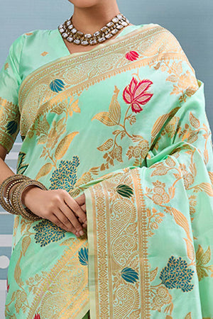 Radiant Sea Green Silk Blend Saree Adorned With Intricate Floral Zari Weaving & Tassel Pallu