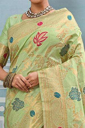 Radiant Pista Green Silk Blend Saree Adorned With Intricate Floral Zari Weaving & Tassel Pallu