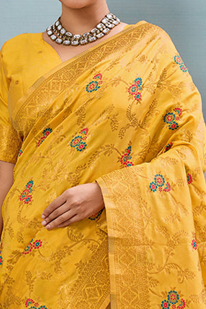 Majestic Bloom Yellow Floral Zari Weaving Silk Blend Saree With Elegant Tassel Pallu