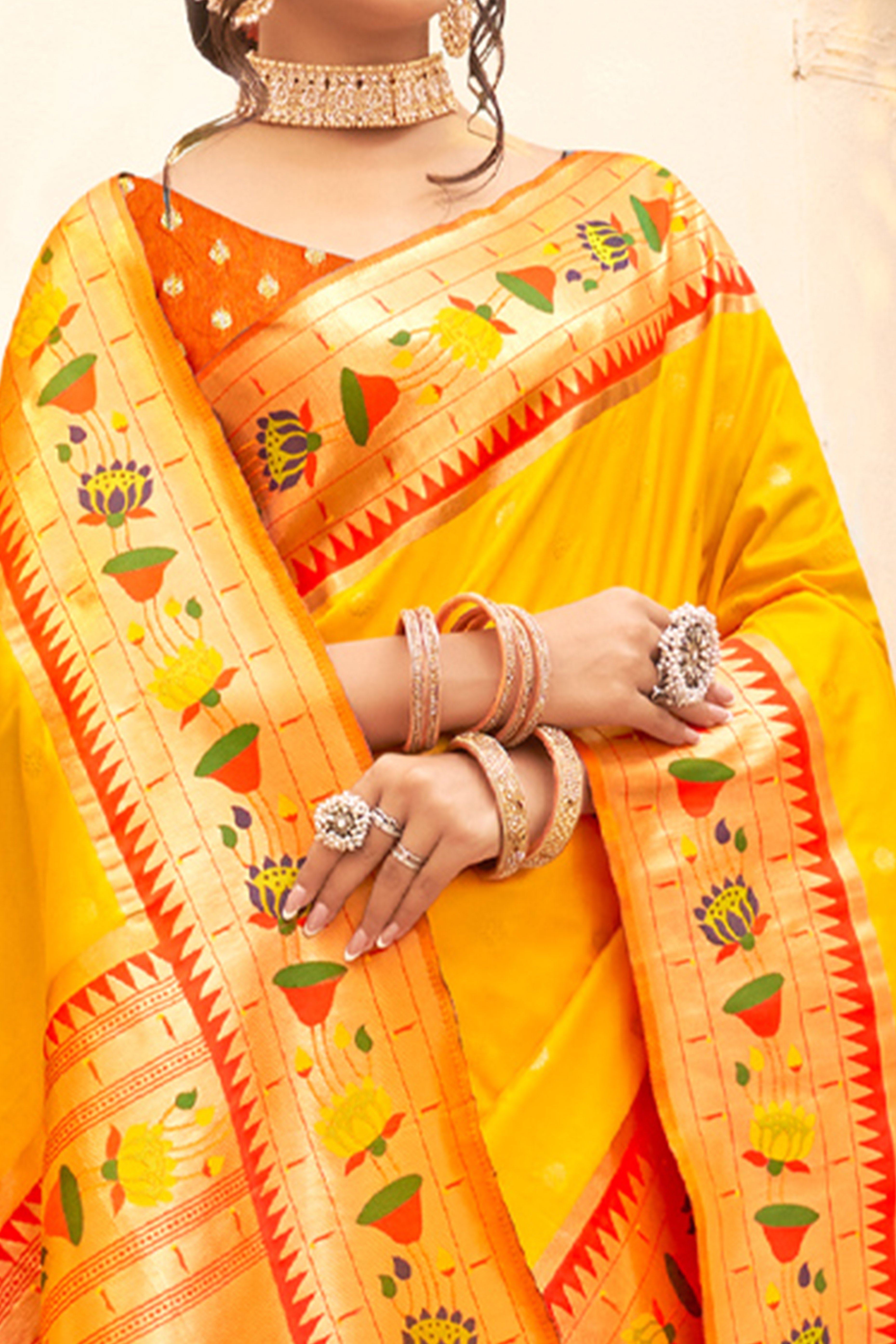 Charming Yellow Floral Zari Woven Silk Blend Saree With Stylish Tassel Pallu