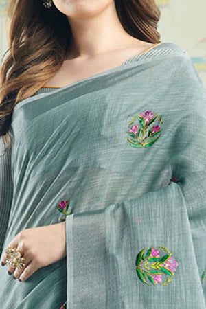 Sea Green Linen Saree with Intricate Floral Embroidery and Classic Weaving