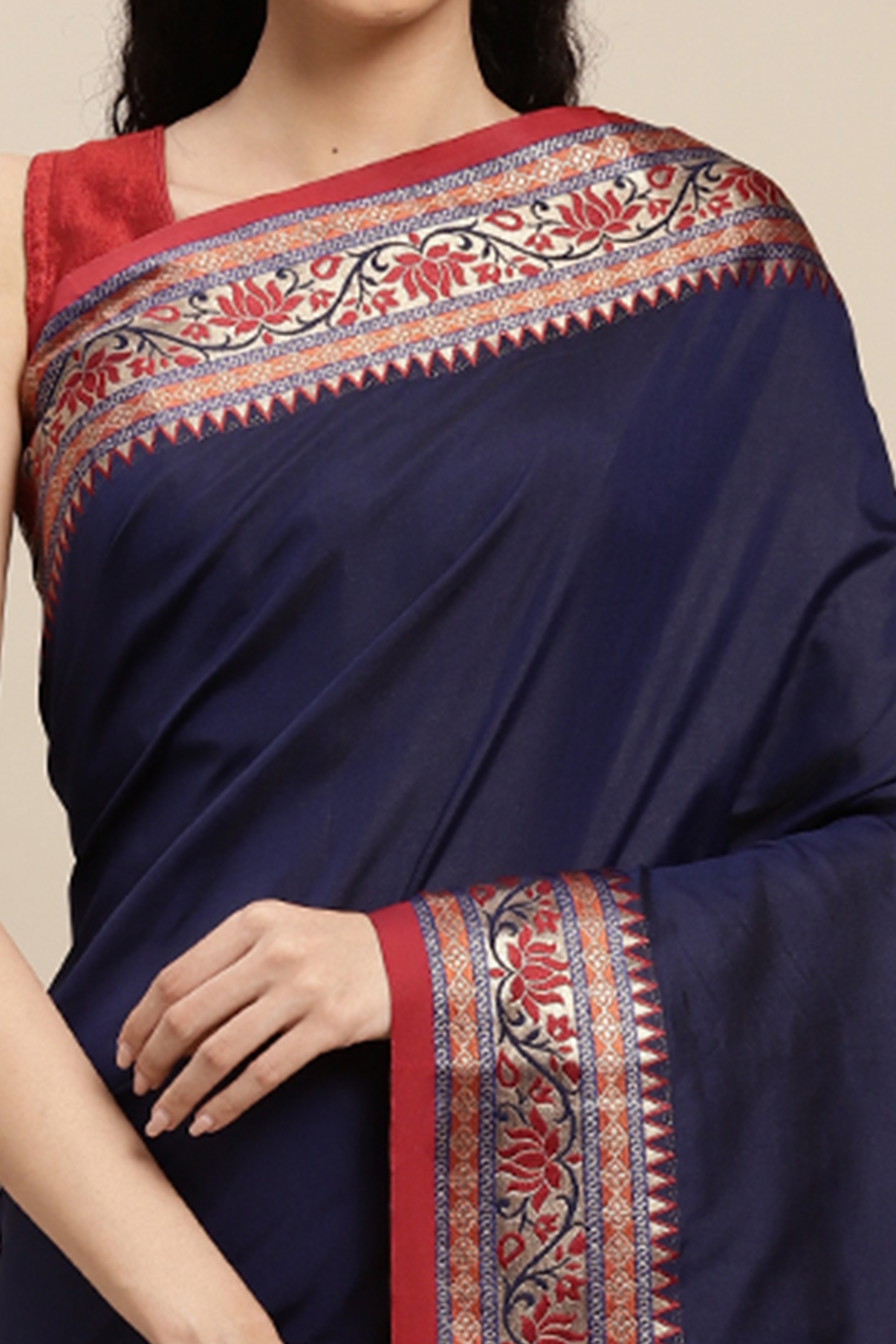 Graceful Navy Blue Solid Saree Highlighted With Floral Zari Weaving On Silk Blend & Tassel Pallu