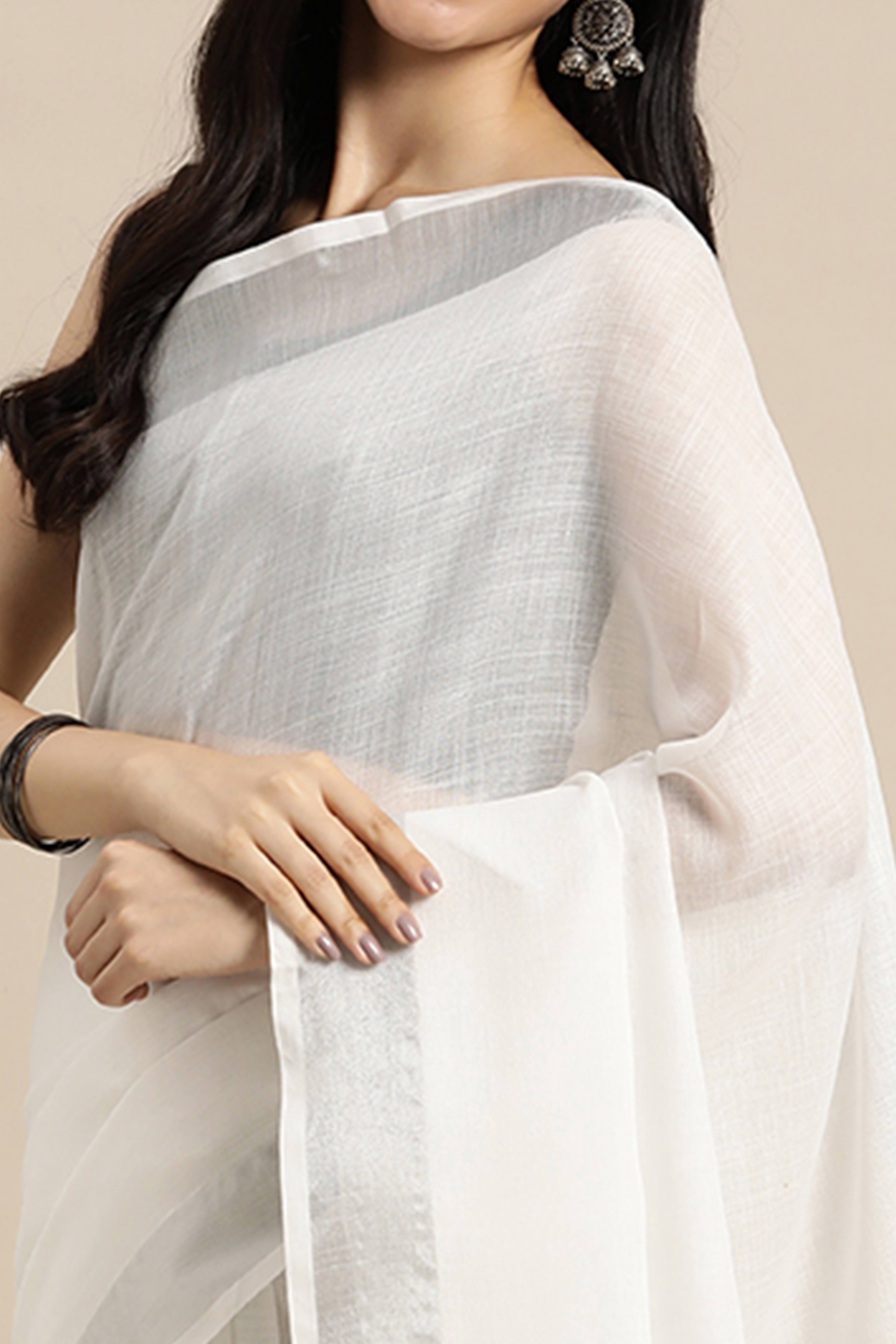 White Linen Saree Adorned With Silver Zari Weaving Border & Pallu