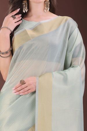 Sea Green Zari Woven Organza Saree With Graceful Tassel Border
