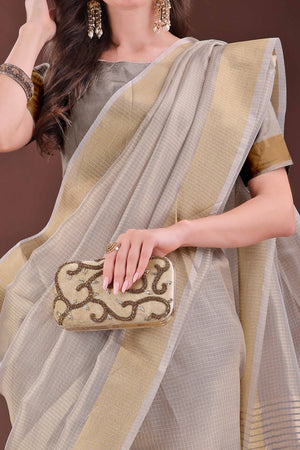 Light Brown Zari Woven Organza Saree With Graceful Tassel Border