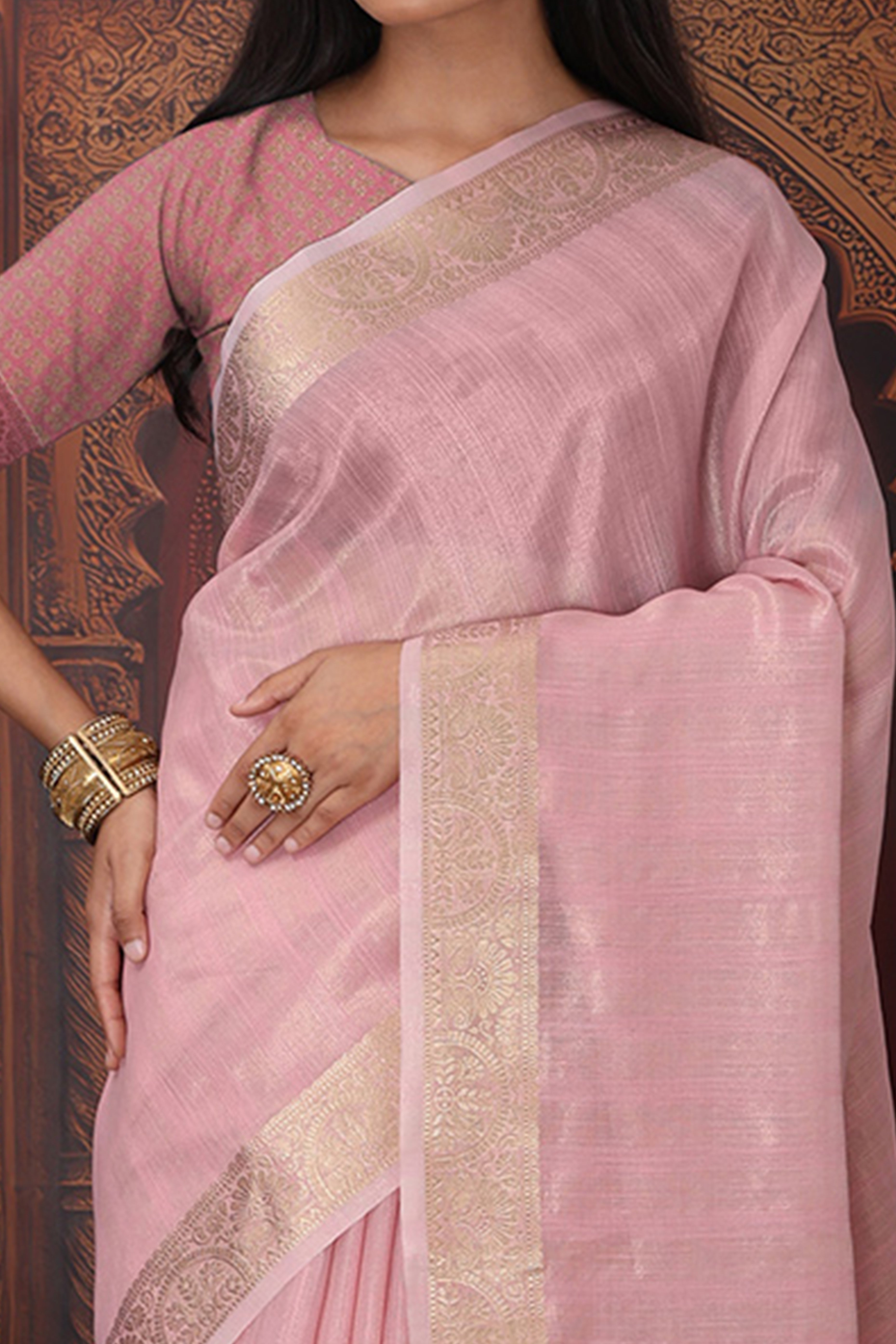 Light Pink Organza Saree Adorned With Floral Zari Weaving & Graceful Tassel Pallu