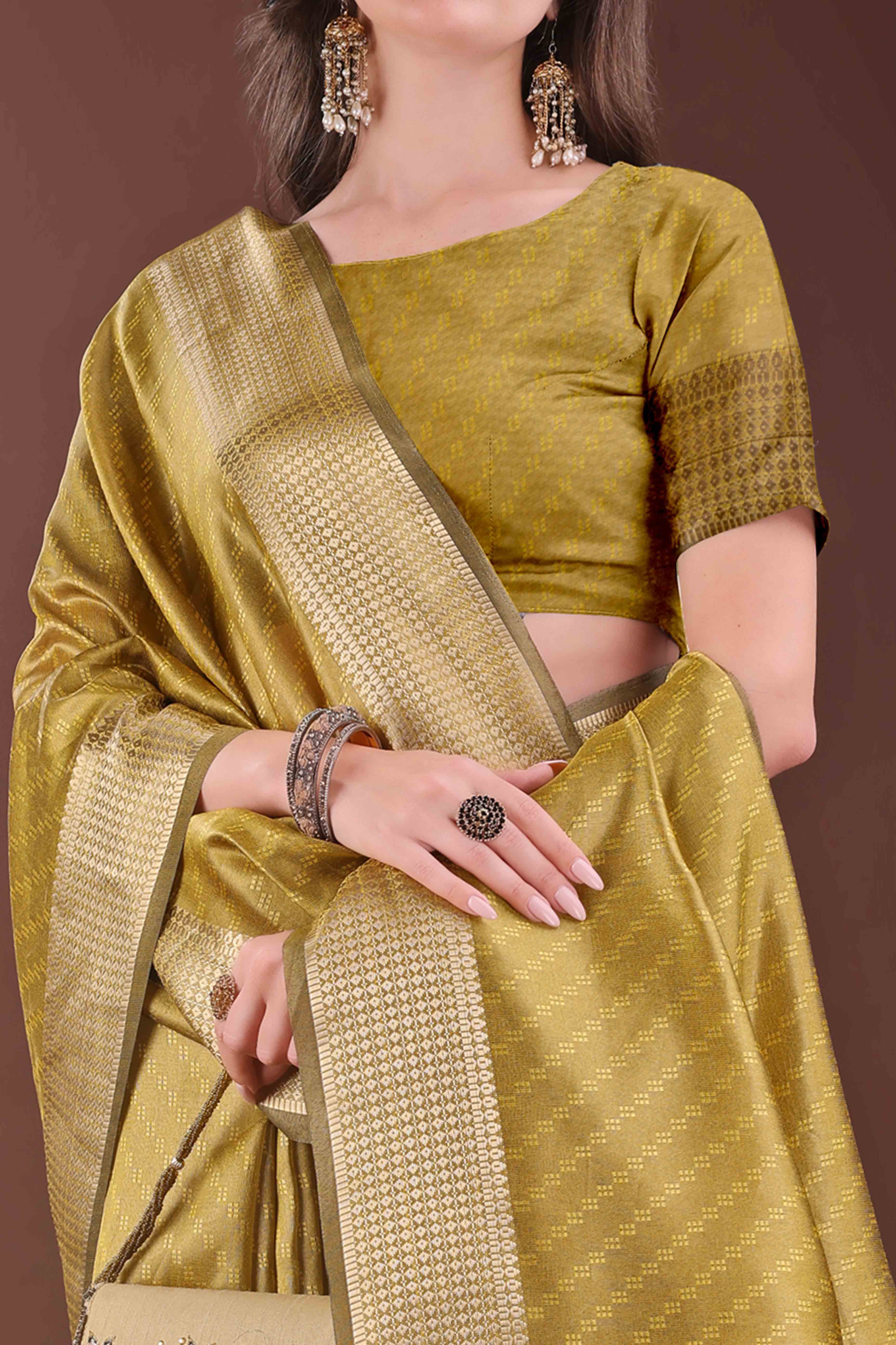 Mustard Zari Weaving Organza Saree With Tassel Border