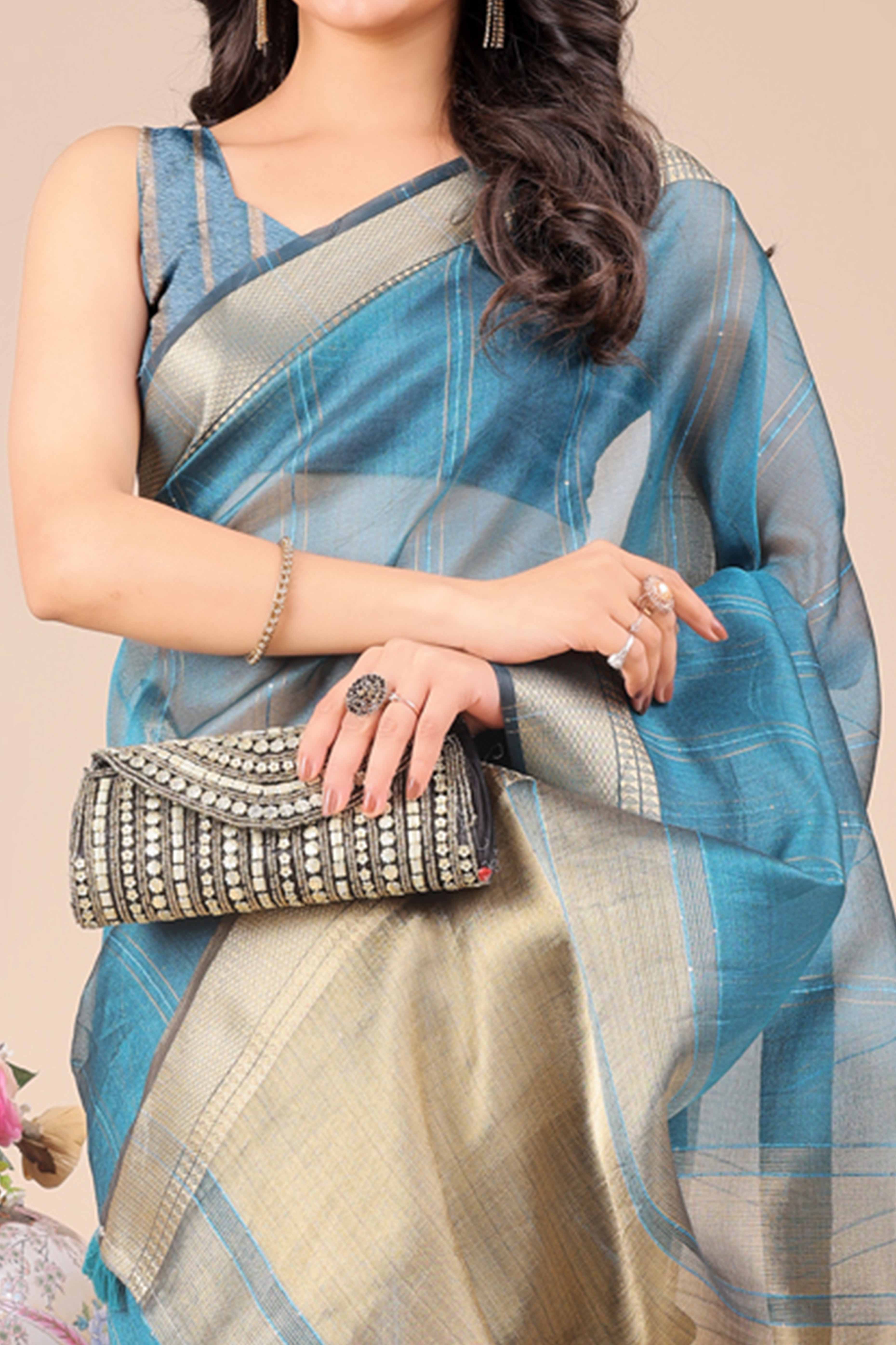 Sky Teal Hue Organza Saree with Shimmering Zari Border Weave