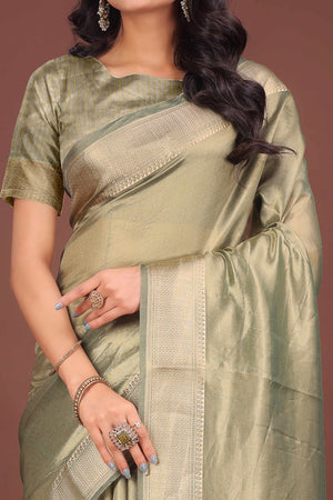 Green Organza Solid Saree With Lustrous Zari Weave &  Delicate Tassels