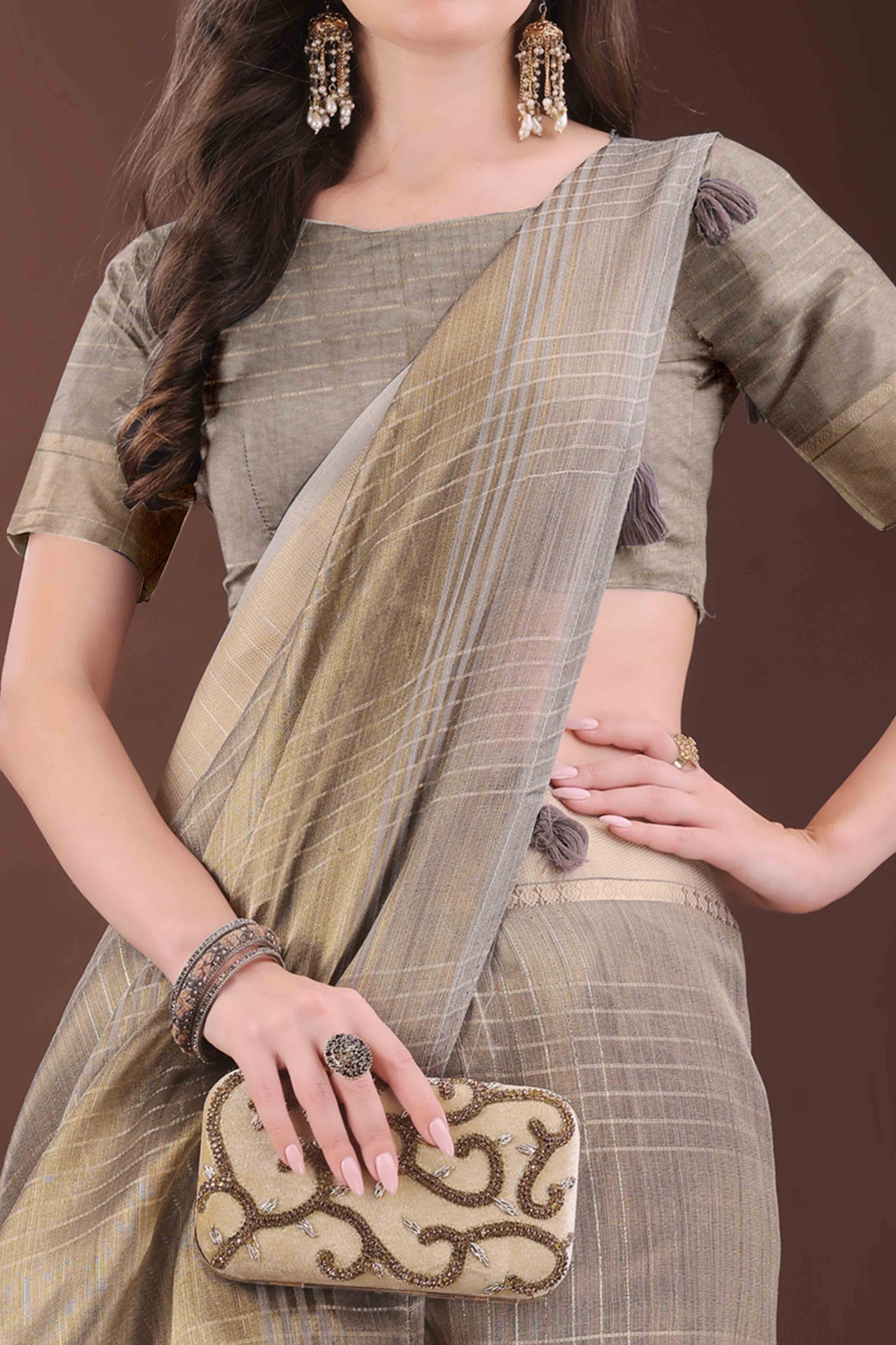 Grey Organza Saree With Zari Weaving Check Patterns & Elegant Tassel Accents