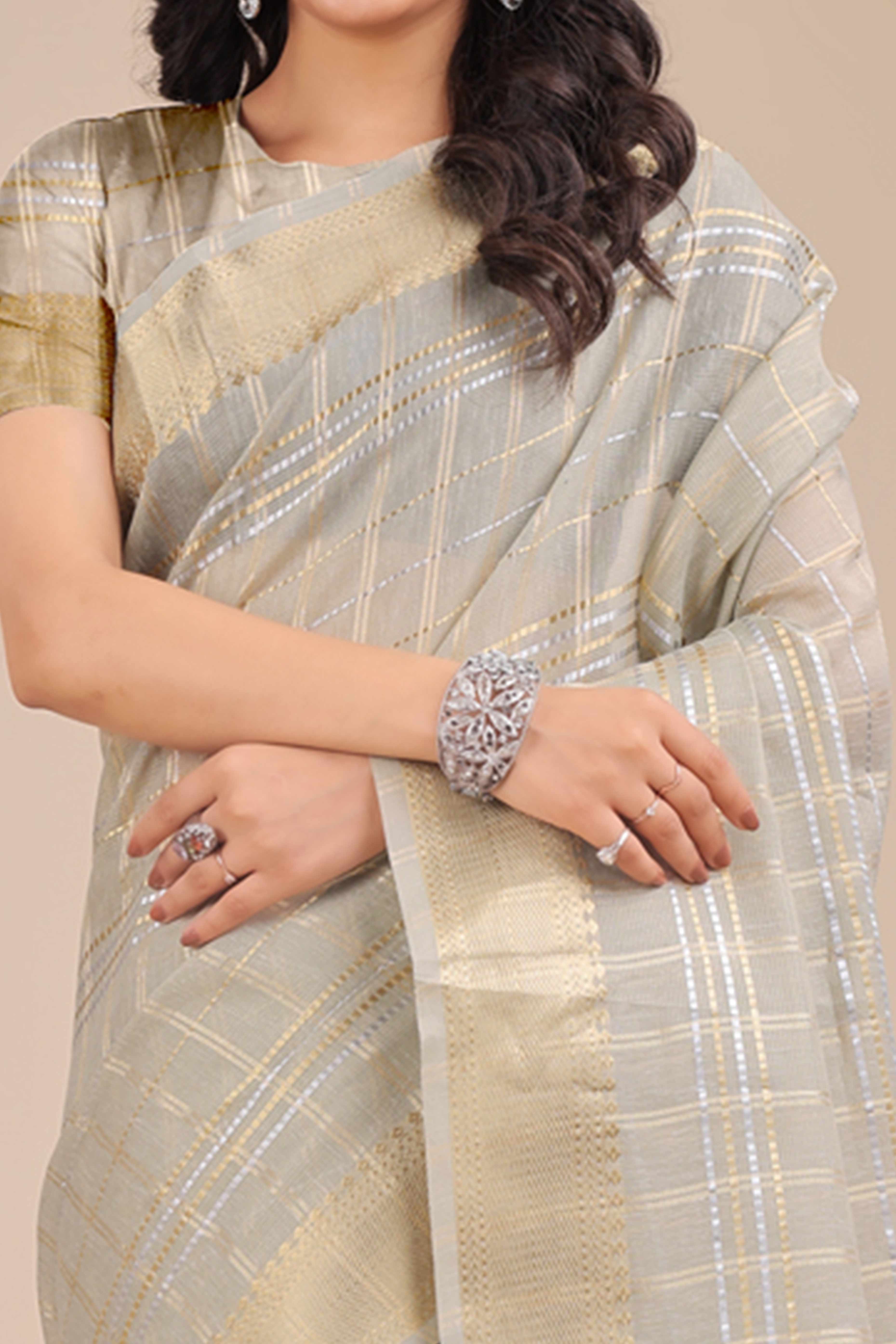 Sea Green Organza Saree with Checkered Zari Weaving and Tassel Detailing