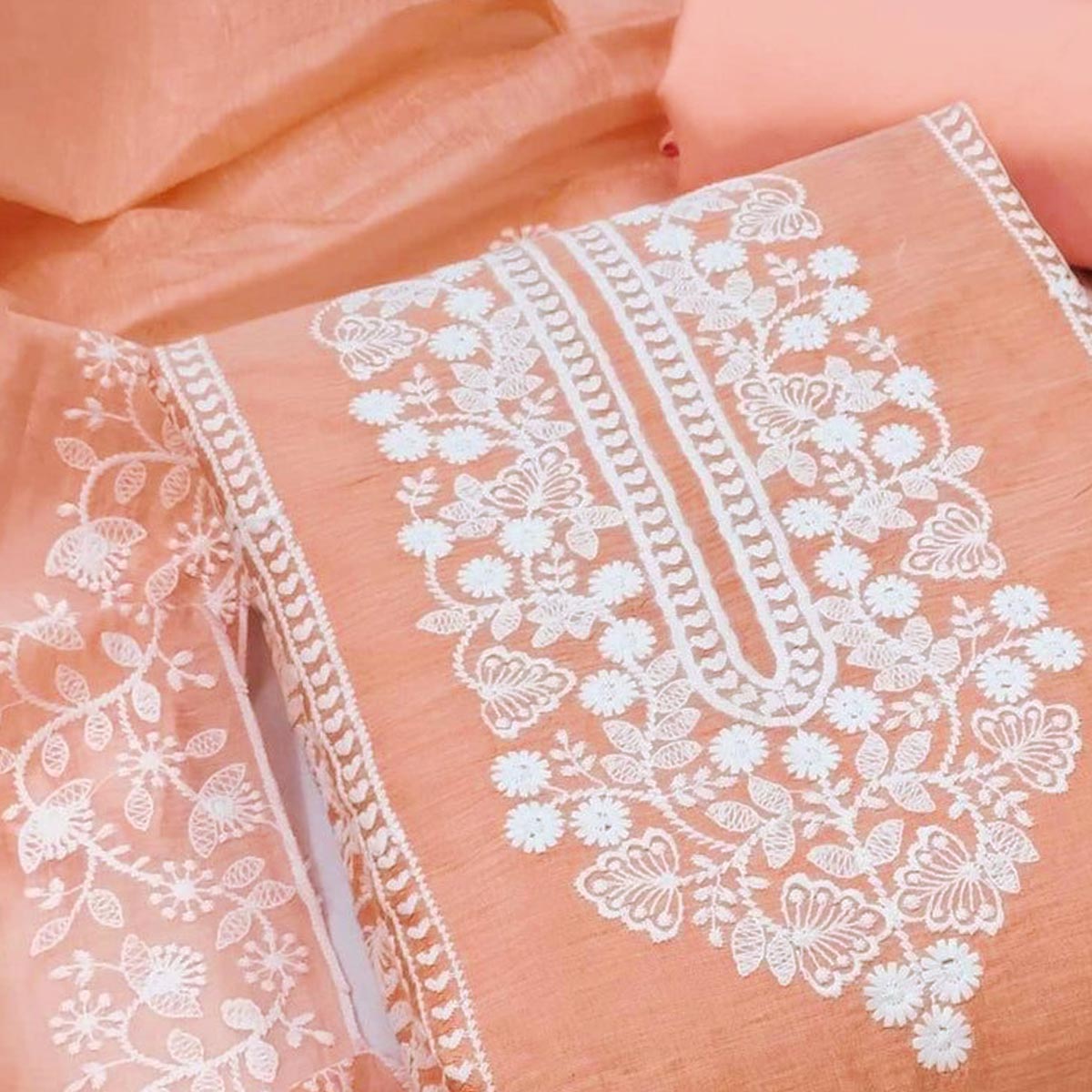 Orange Cotton Blend Unstitched Suit Set Highlighted with Soft Floral Embroidery