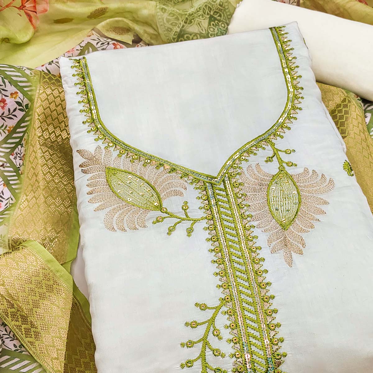 Elegant Cream & Green Floral Embroidered Roman Cotton Silk Dress Material With Subtle Sequins Work