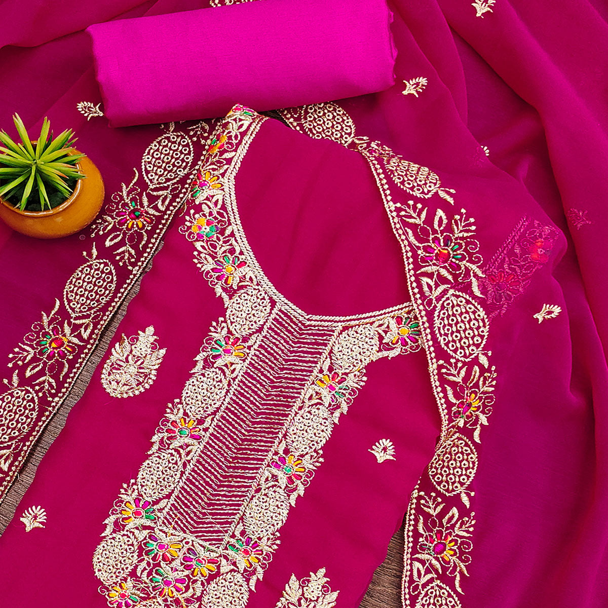 Rani Pink Designer Georgette Dress Material Adorned With Intricate Floral Embroidery