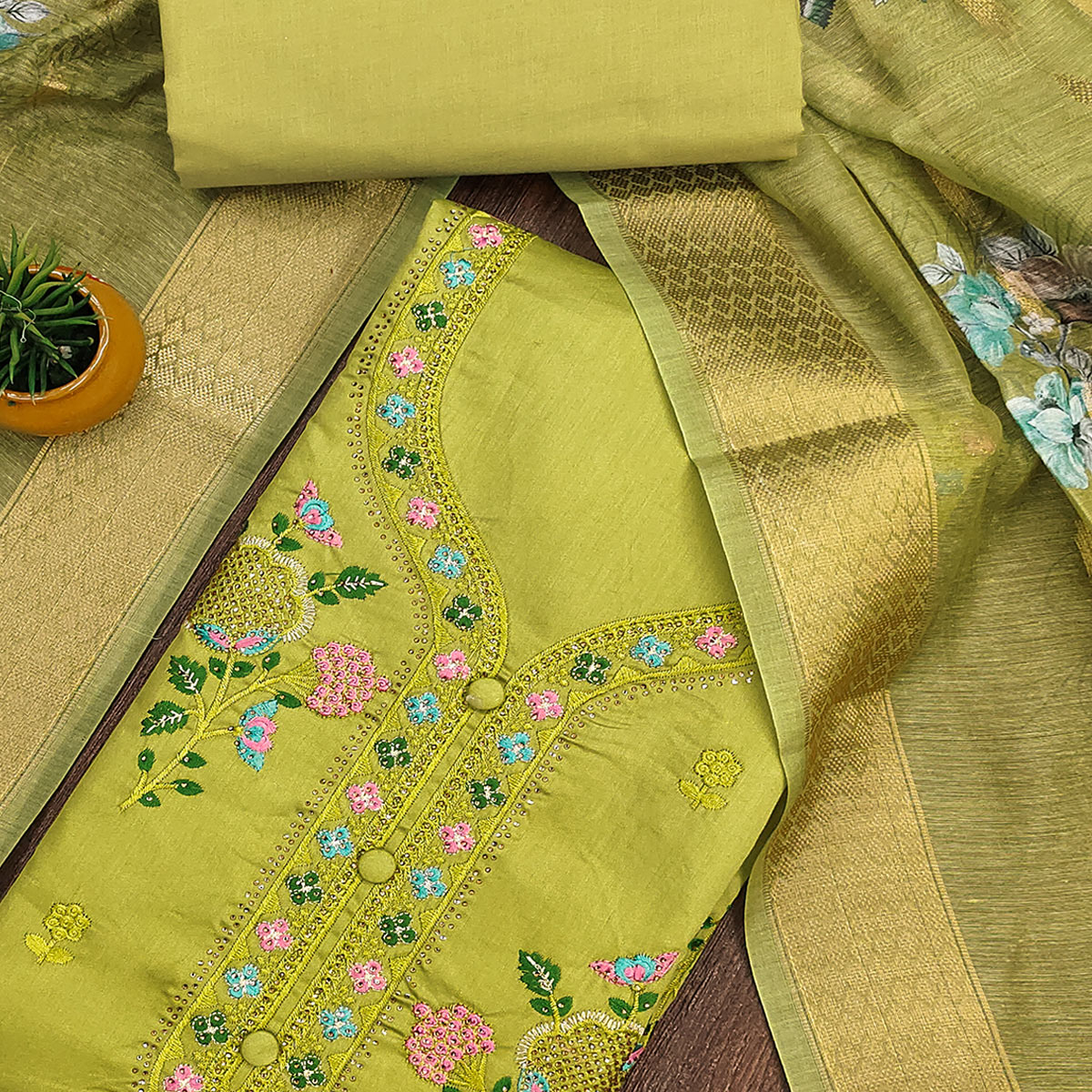 Elegant Green Pure Cotton Dress Material Showcasing Fine Floral Embroidery & Swarovski Work