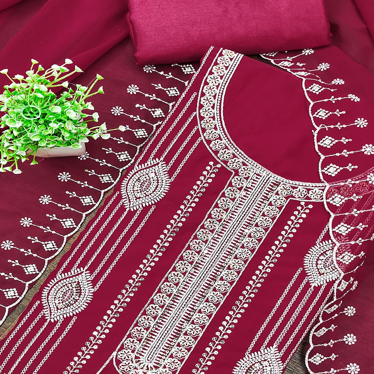 Pink Star Georgette Suit Fabric Highlighted with Fine Thread Embroidery Work