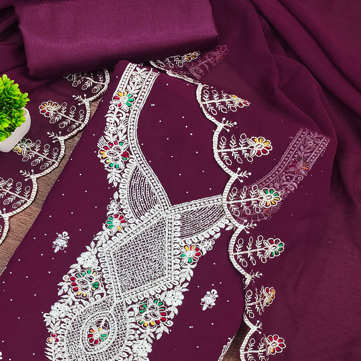 Wine Georgette Dress Material Adorned With Elegant Floral Embroidery & Shimmering Swarovski Work