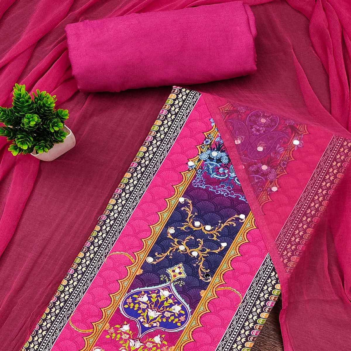 Stylish Rani Pink Floral Digital Printed Rayon Dress Material Adorned With Mirror Embellishments