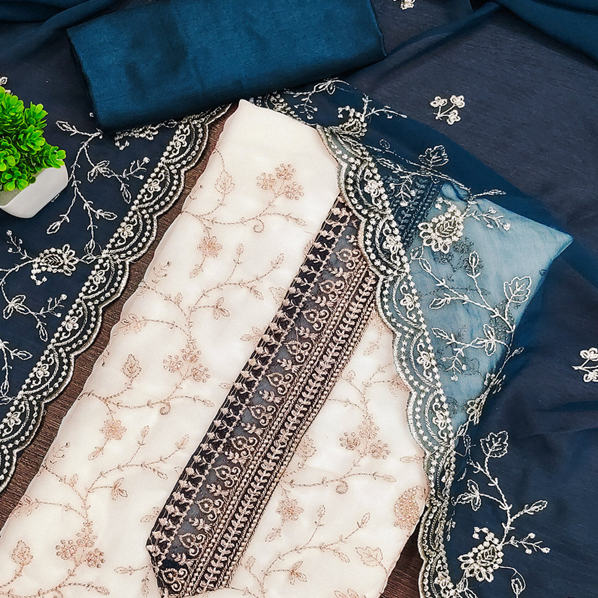 White & Blue Georgette Dress Material Showcasing Elegant Floral Thread Embroidery Work