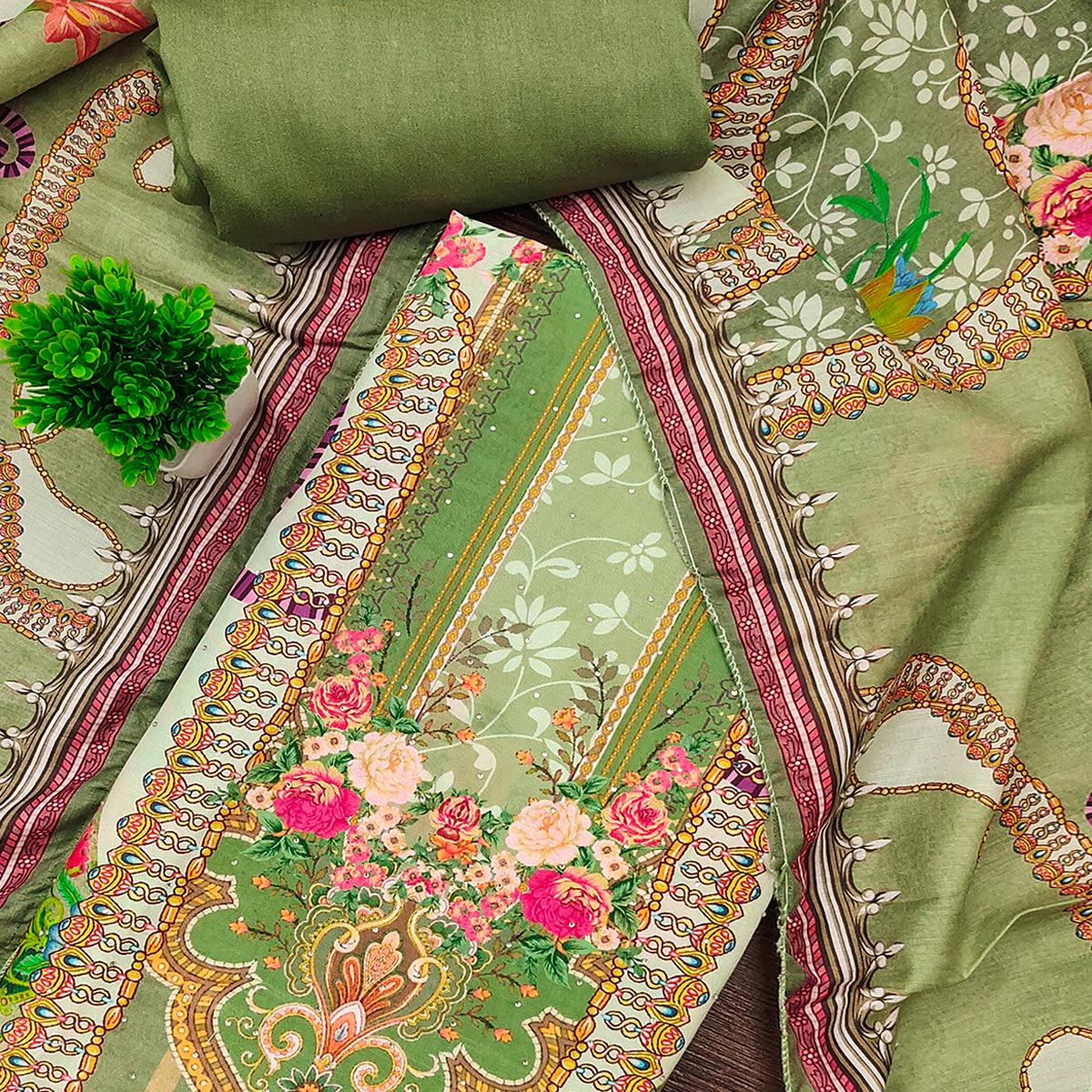 Green Muslin Dress Material Featuring Elegant Floral Digital Print Adorned With Swarovski Work