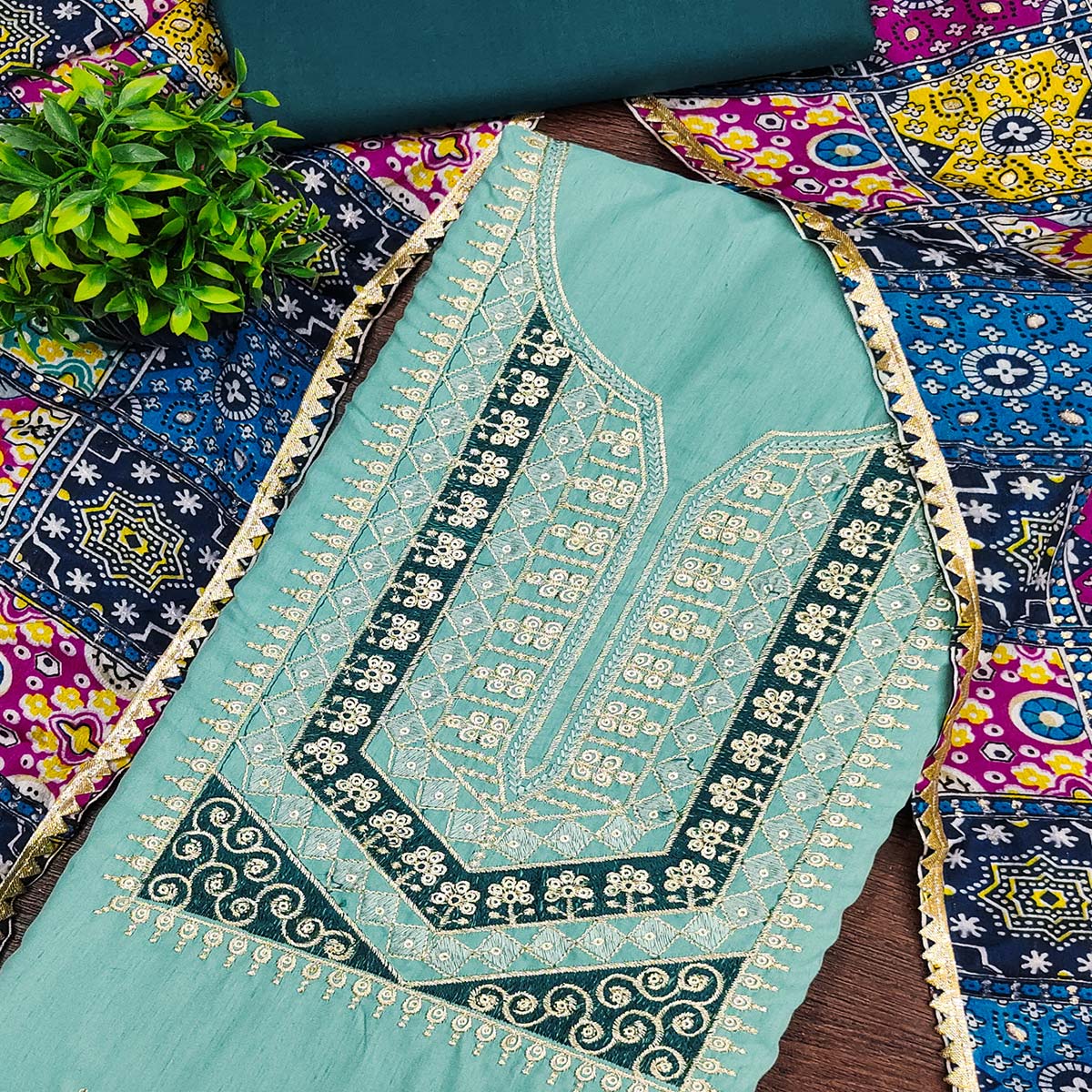 Stylish Turquoise Cotton Blend Dress Material Enriched With Floral Embroidery & Sequins Work