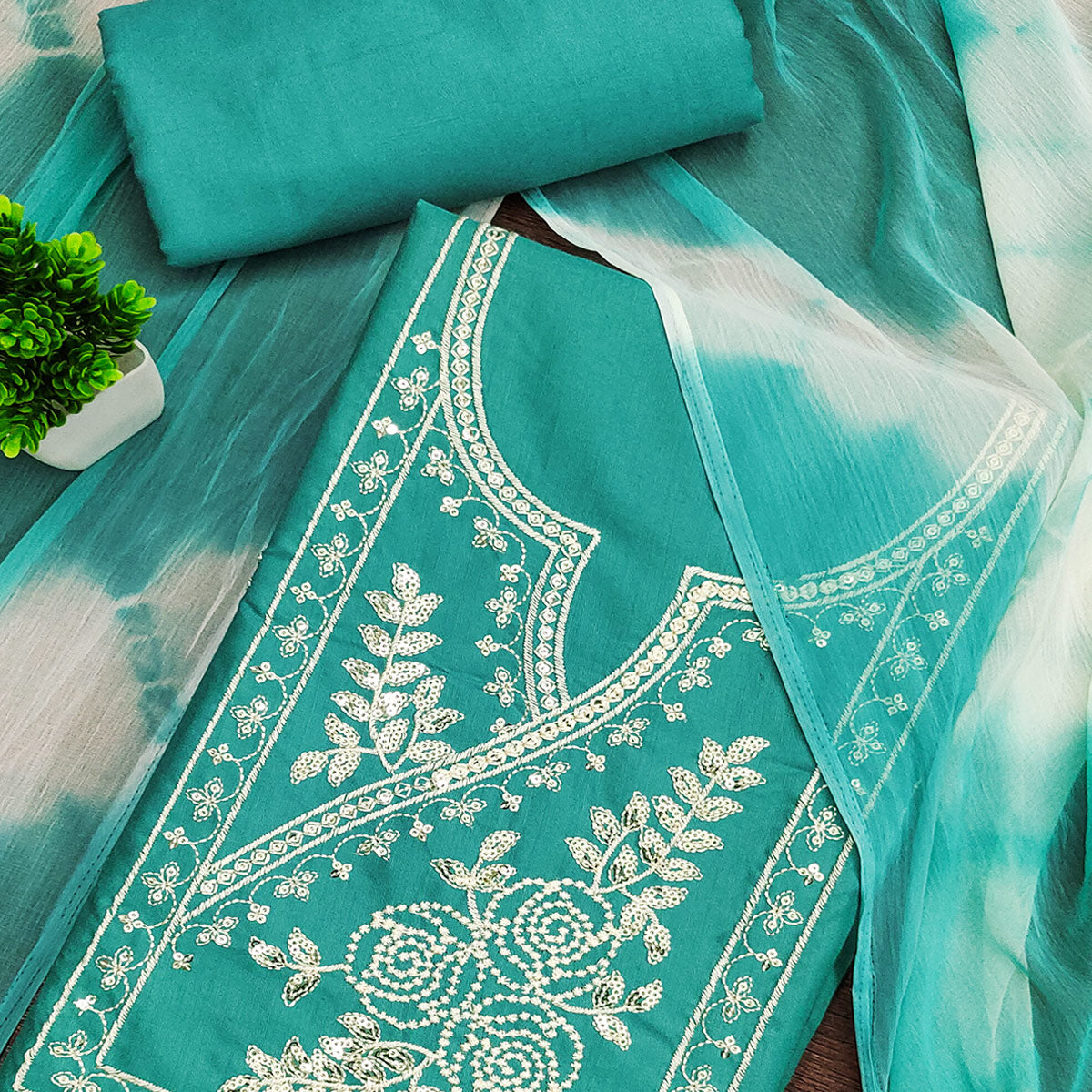 Turquoise Cotton Blend Dress Material Highlighted With Floral Thread & Sequins Work