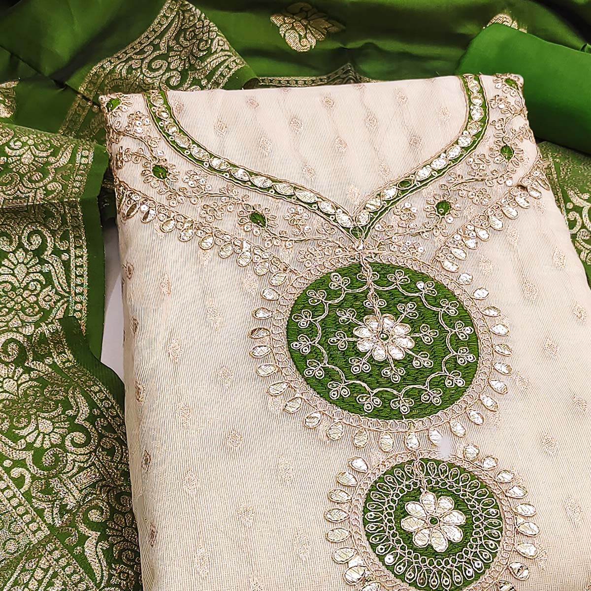Cream & Green Shimmer Dress Material Featuring Intricate Zari Weaving With Cording Embroidery