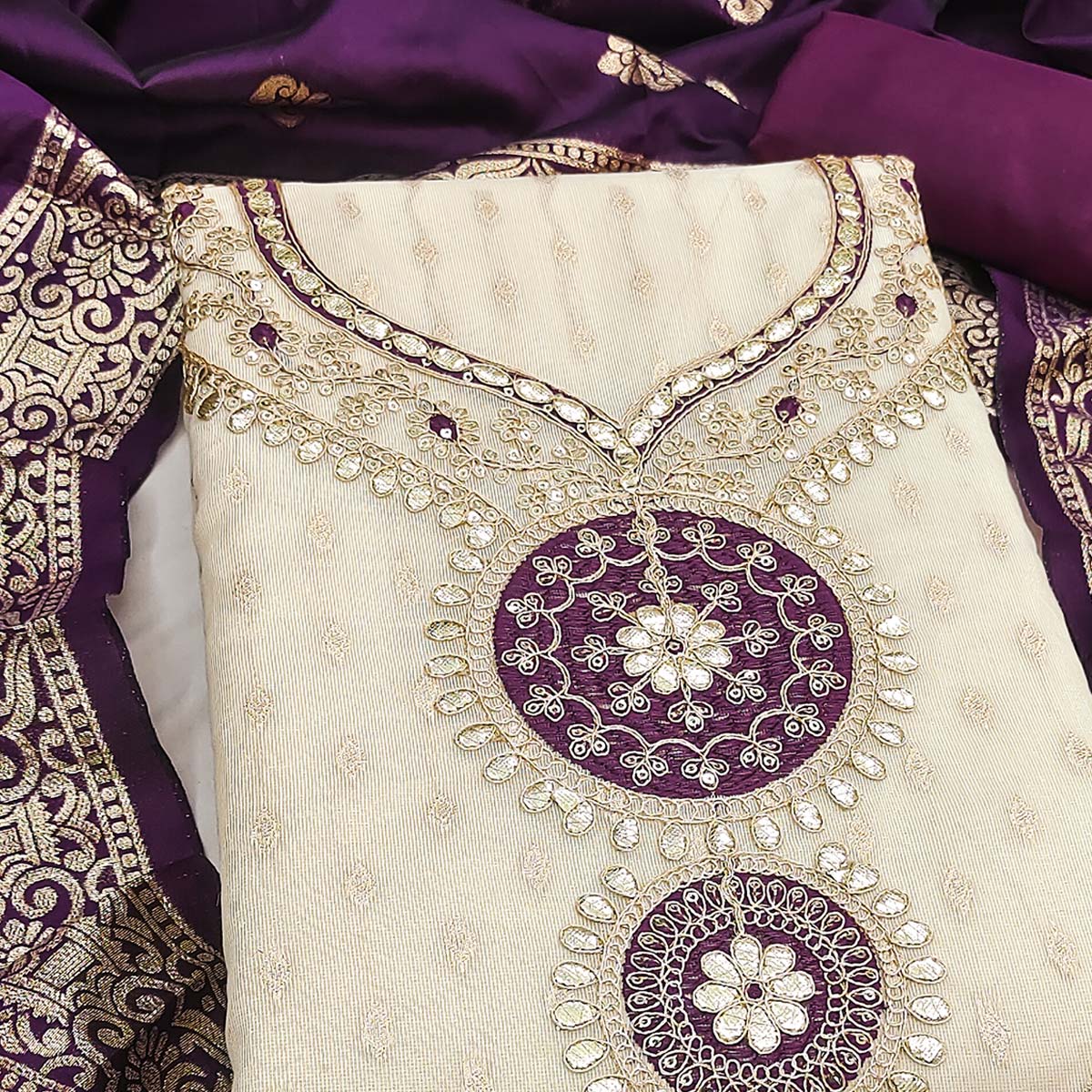 Cream & Purple Shimmer Dress Material Featuring Intricate Zari Weaving With Cording Embroidery