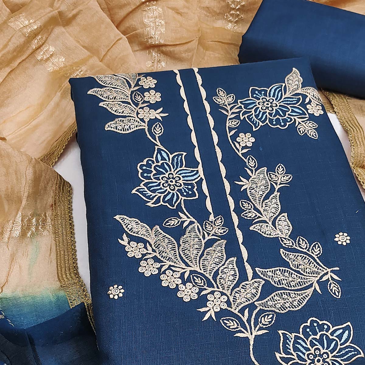 Blue Cotton Blend Dress Material Adorned With Elegant Floral Embroidery & Sequins Detailing