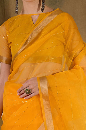 Yellow Organza Silk Saree Featuring Shimmering Sequins Embroidery & Elegant Tasselled Pallu