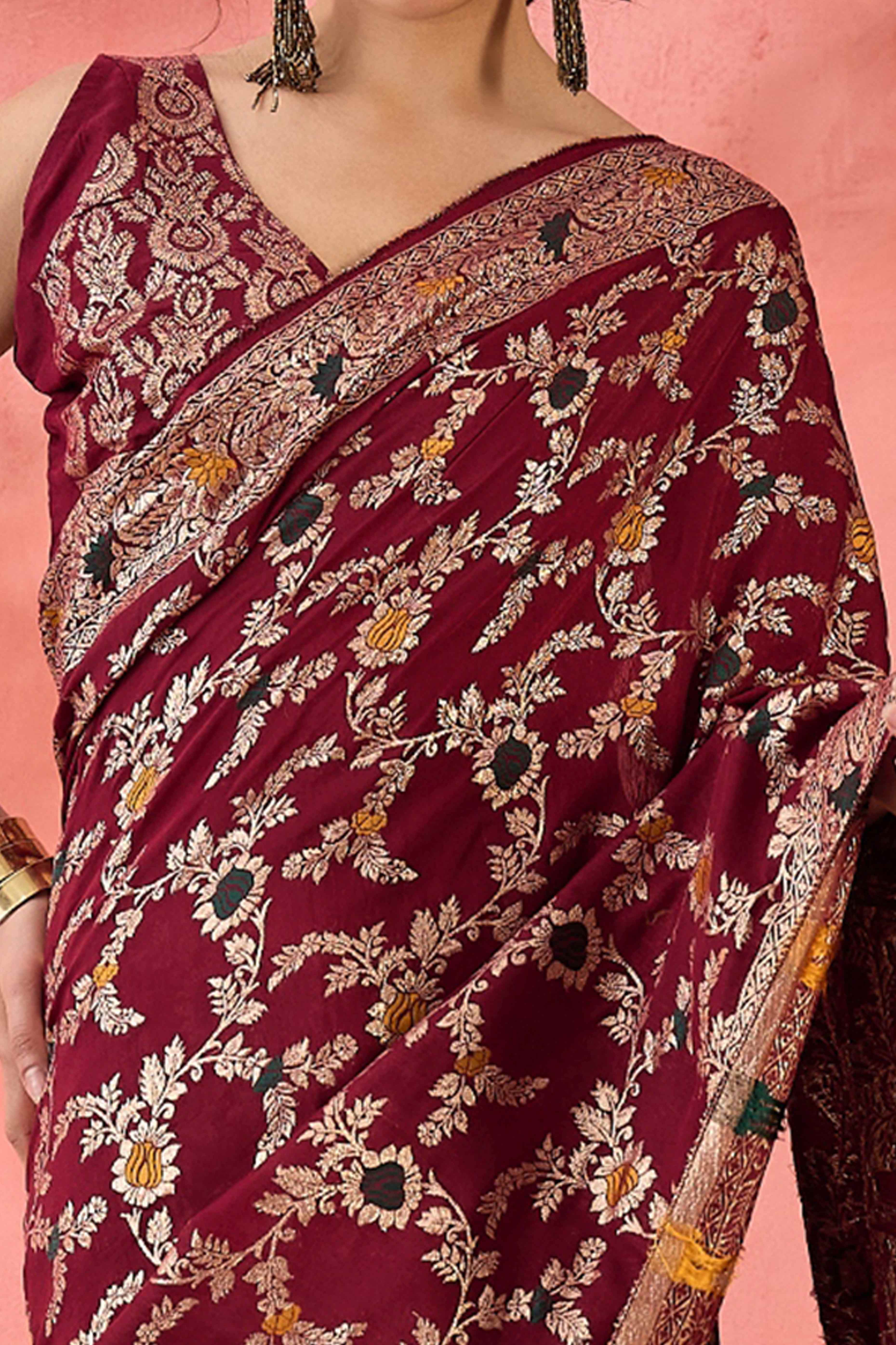 Maroon Cotton Meena jacquard Saree Featuring Intricate Floral Weaving & Tassels On The Pallu