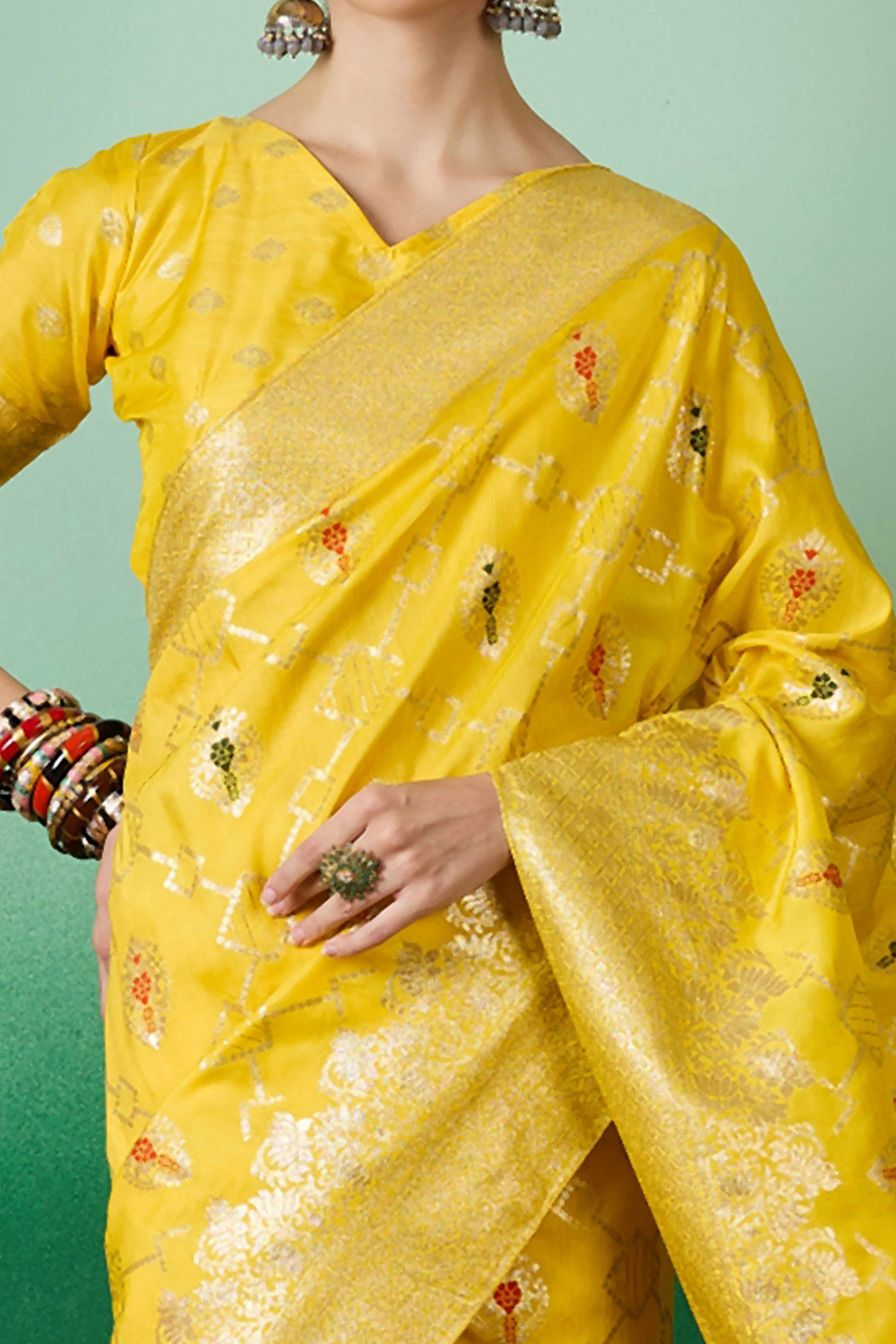 Yellow Zari Woven Staple Cotton Blend Saree With Floral Motifs & Tassel Detailed Pallu