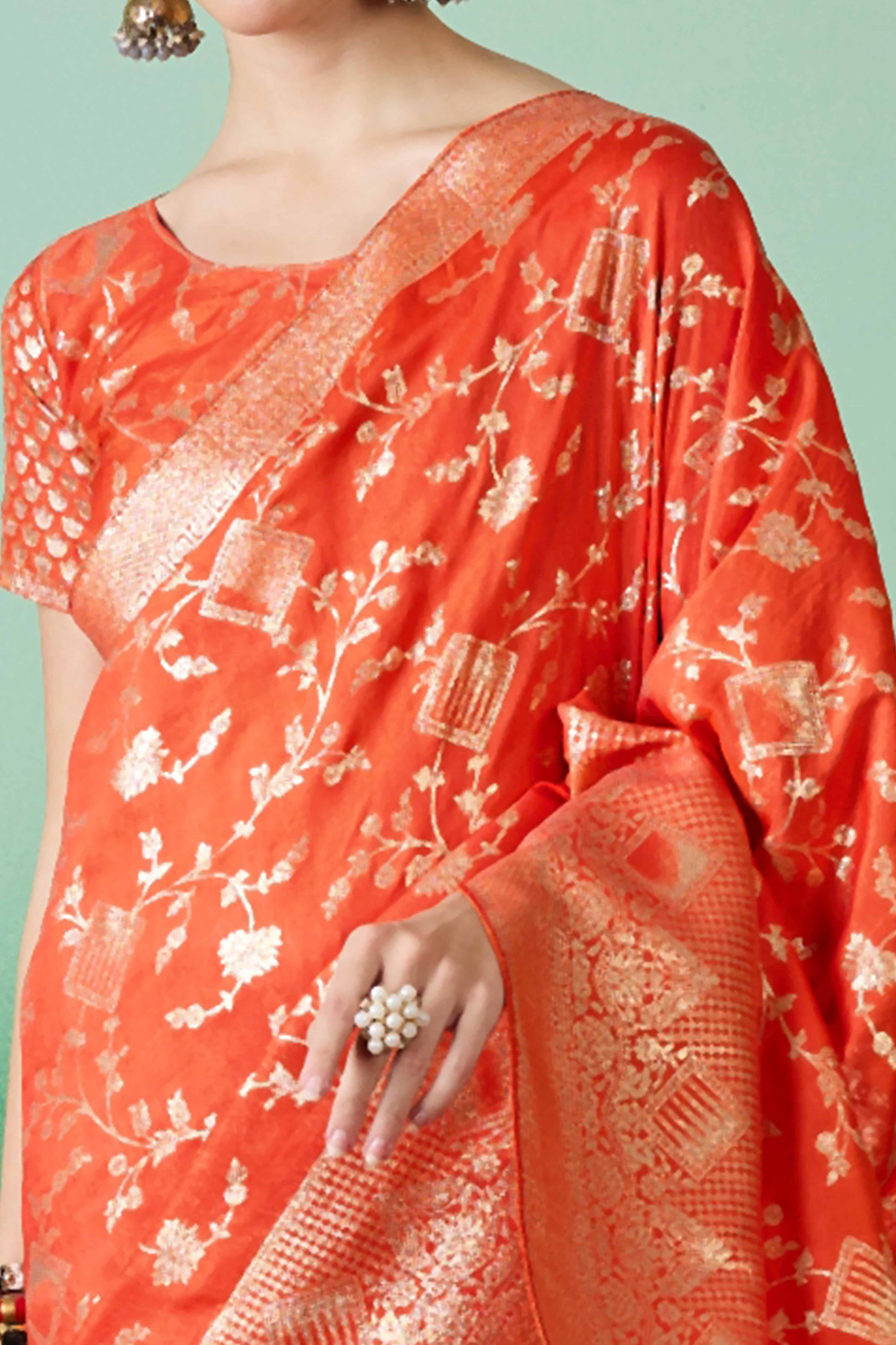 Orange Cotton Blend Saree With Intricate Floral Zari Weaving & Soft Tassel