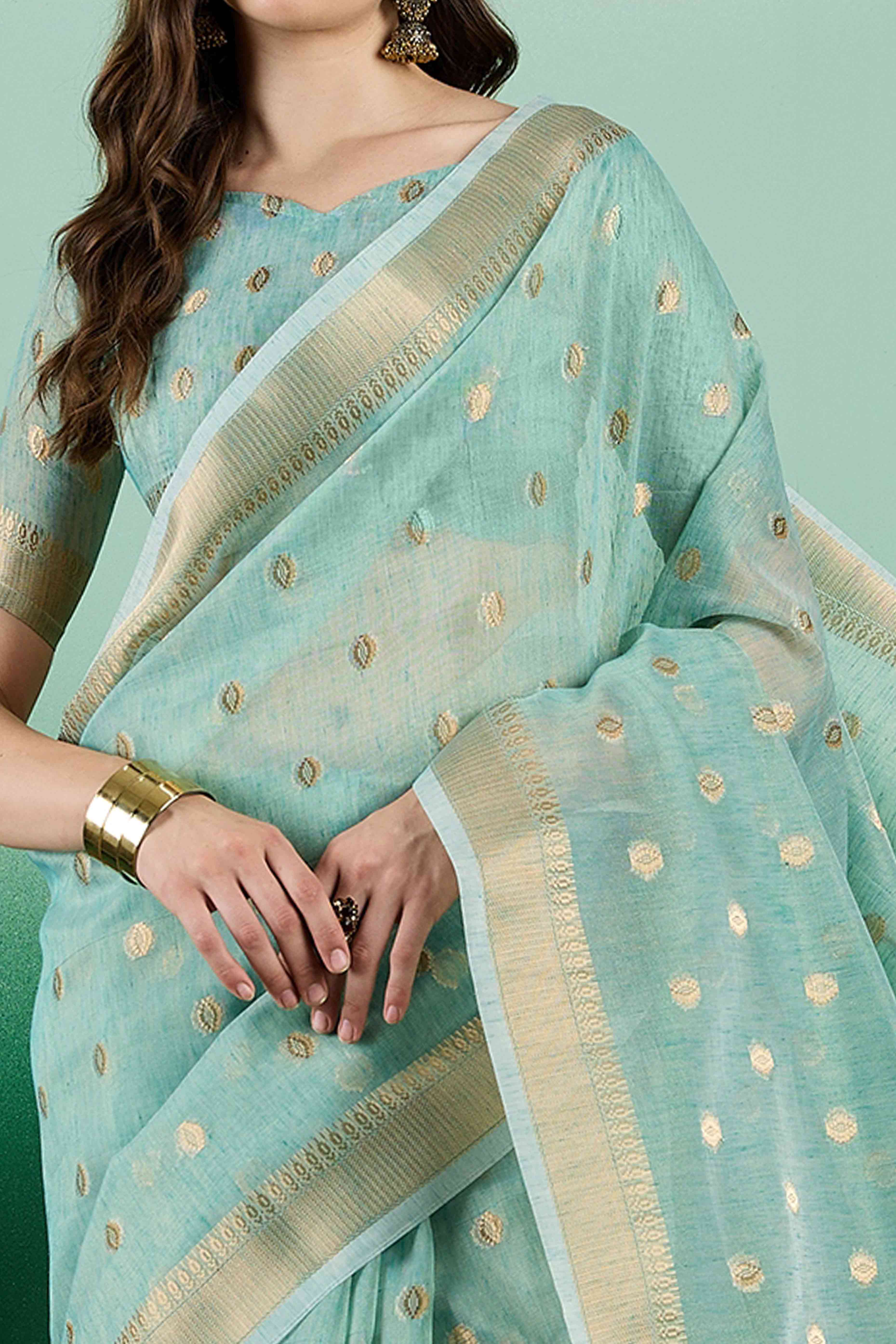 Blue Khadi Organza Saree Embellished With Traditional Zari Work & Tassels