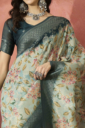 Turquoise Saree In Poly Cotton Featuring Intricate Floral Zari Weaving & Tassel Accents