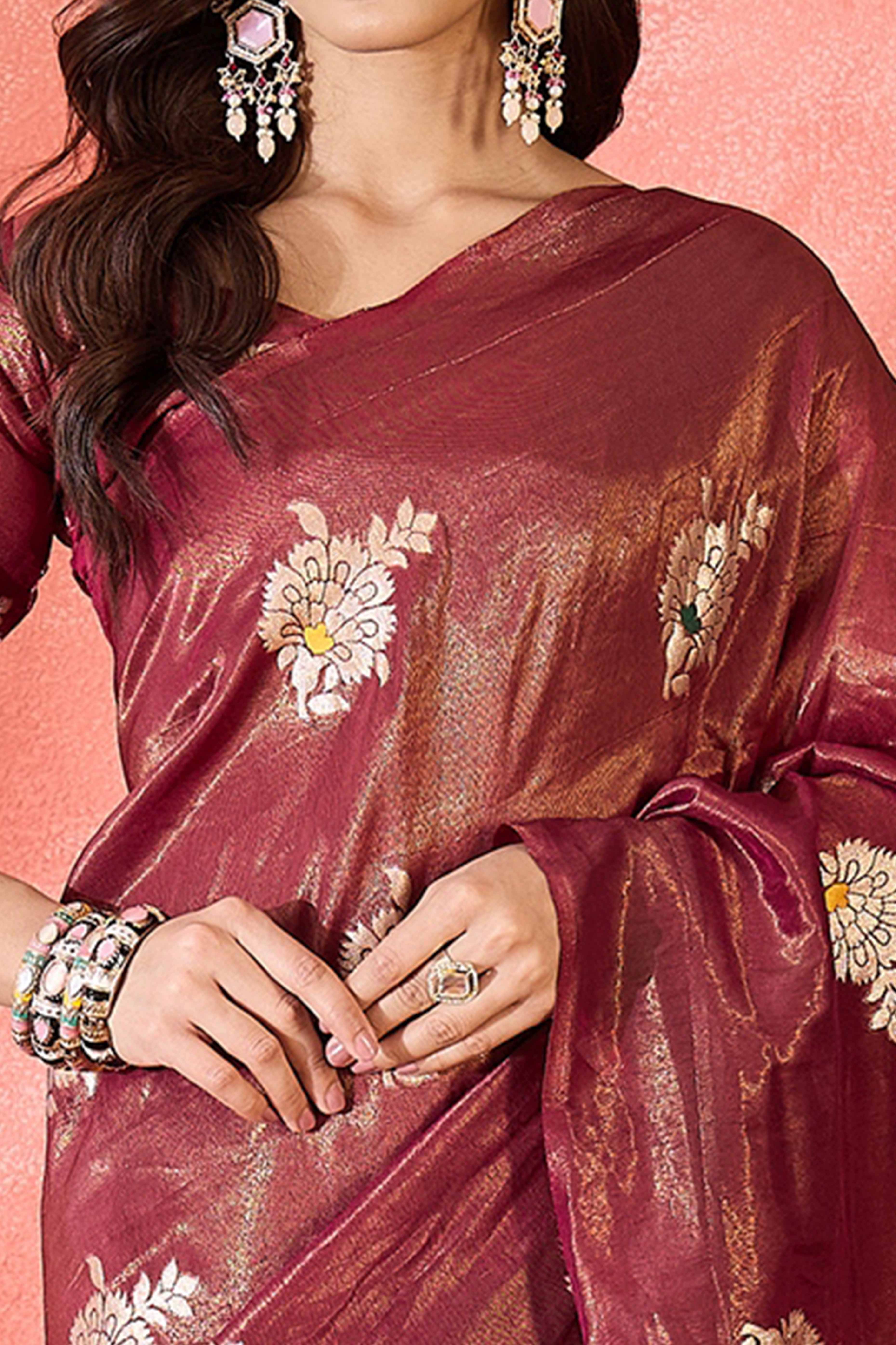 Wine Shimmer Saree Featuring Intricate Floral Zari Weaving & Tassel Finish
