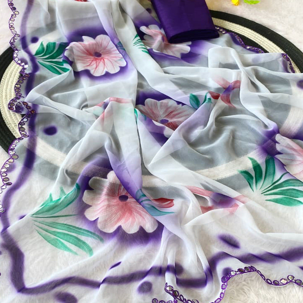 Charming Purple Floral Digital Print Saree Crafted In Georgette With Stylish Embroidered Border