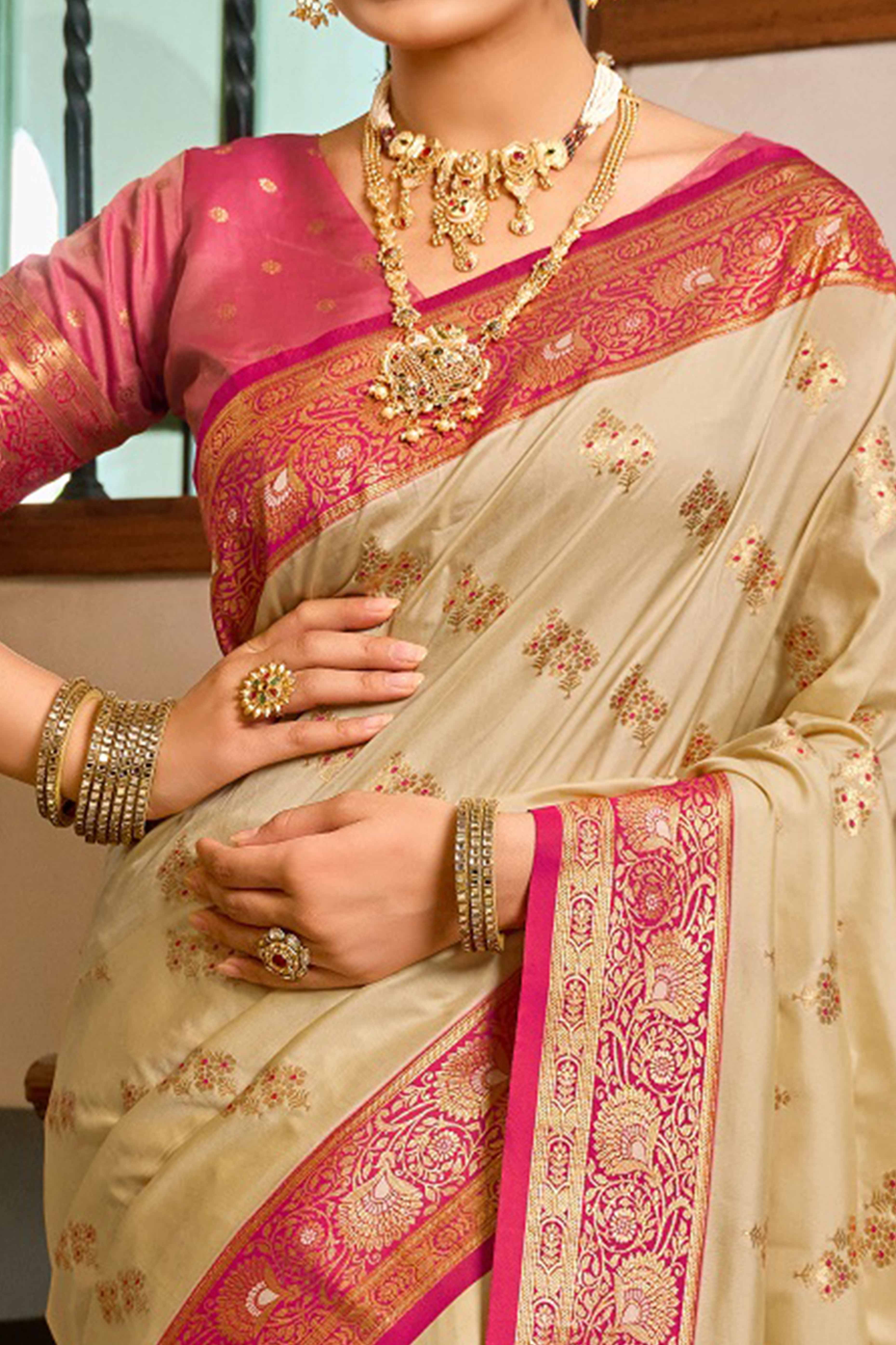 Cream Silk Blend Saree Featuring Intricate Floral Zari Work