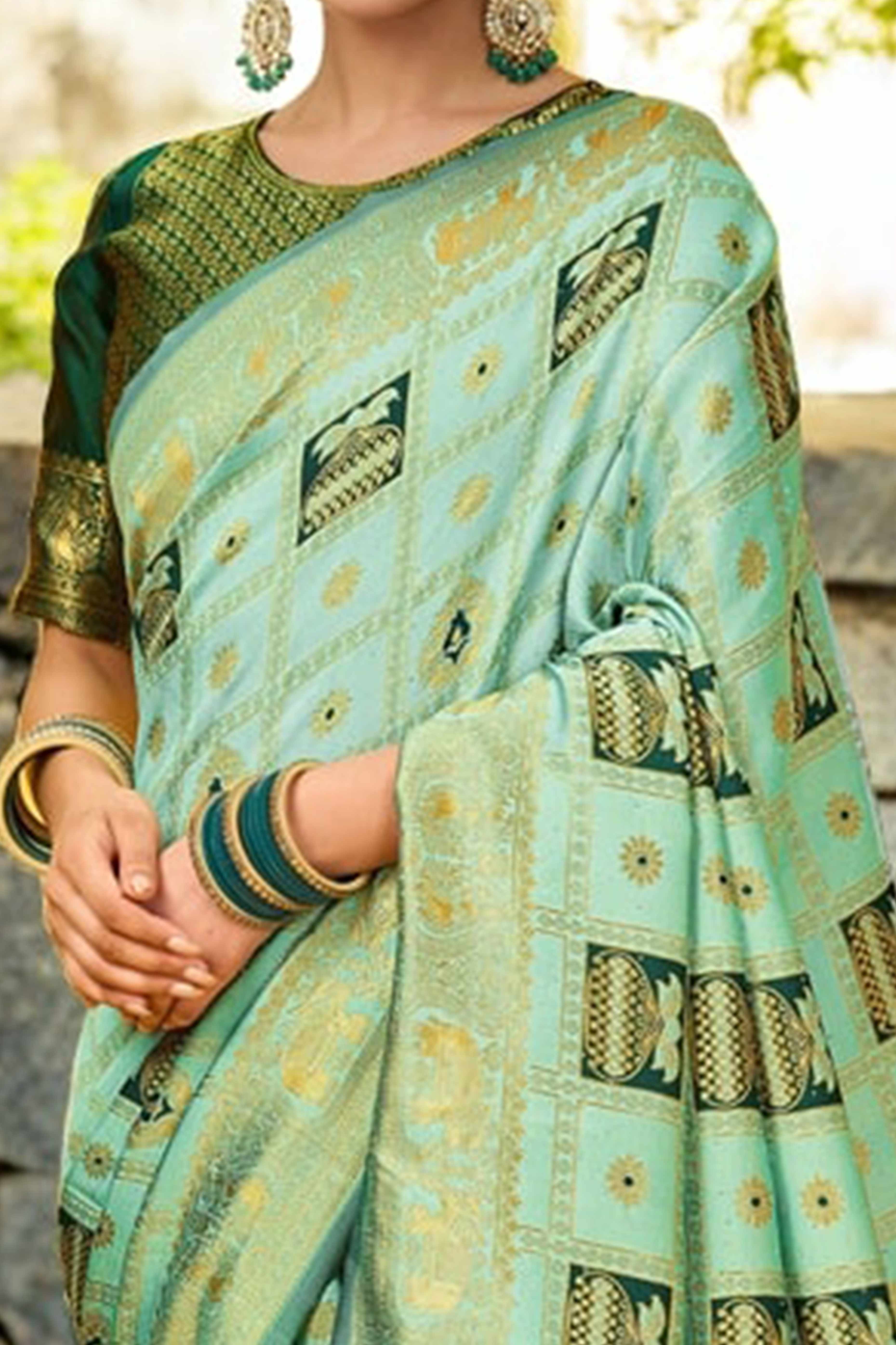 Light Green Floral Weaving Paithani Saree In Soft Silk Accented With A Stylish Tassel Border Pallu