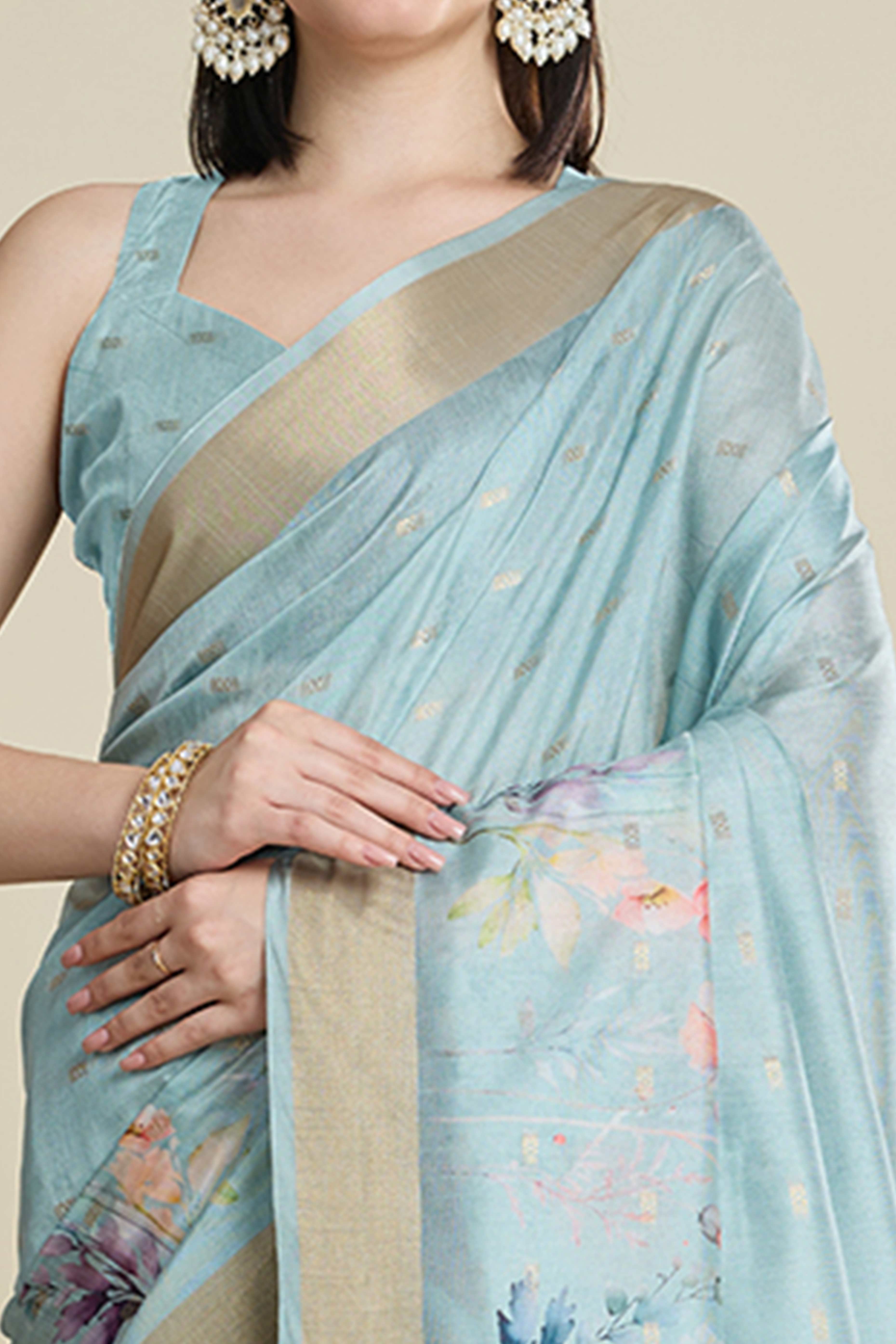 Sky Blue Cotton Blend Saree Featuring Floral Prints and a Festive Zari Border Accent