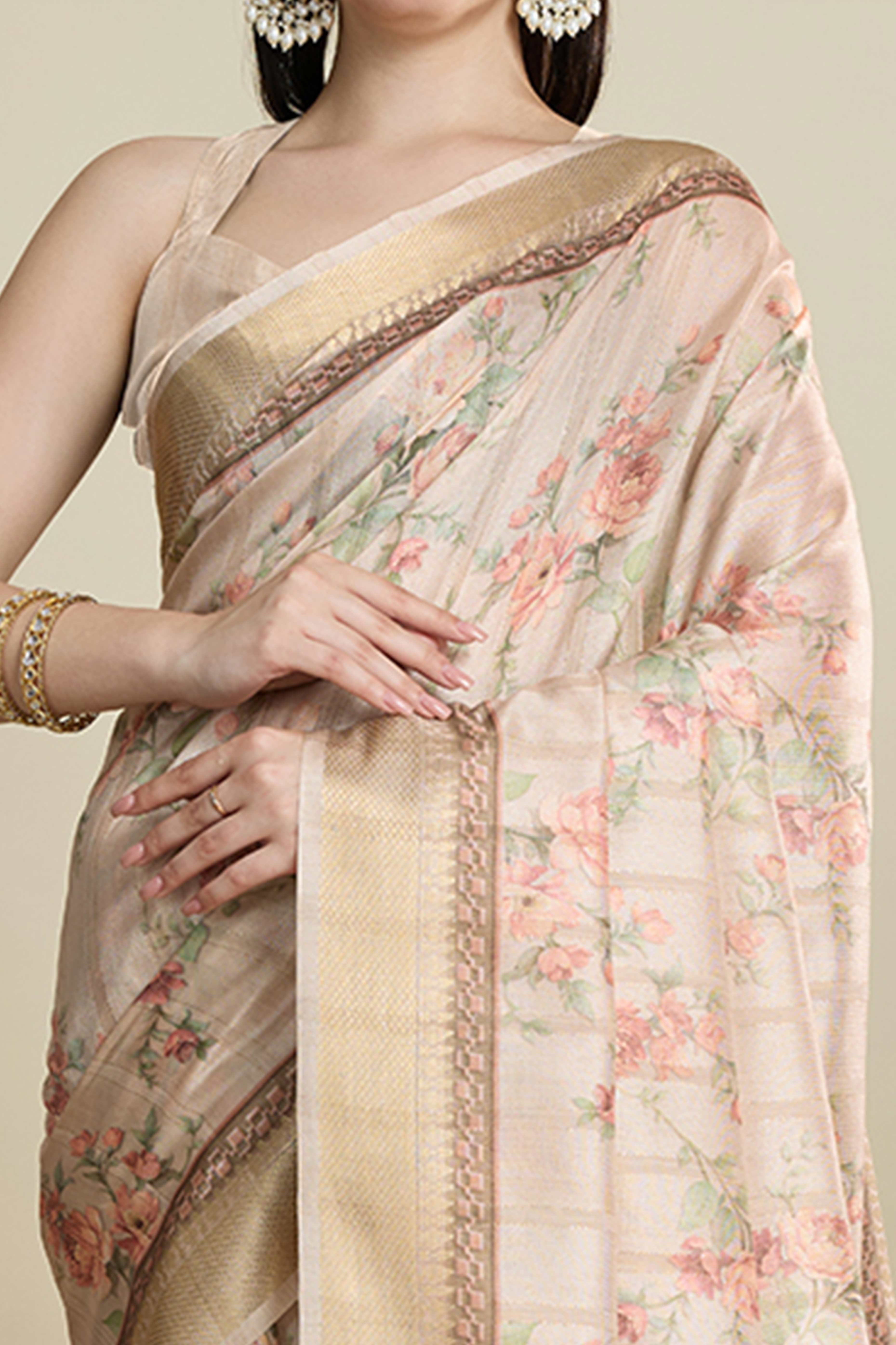 Cream Cotton Blend Saree Featuring Floral Prints and a Festive Zari Border Accent