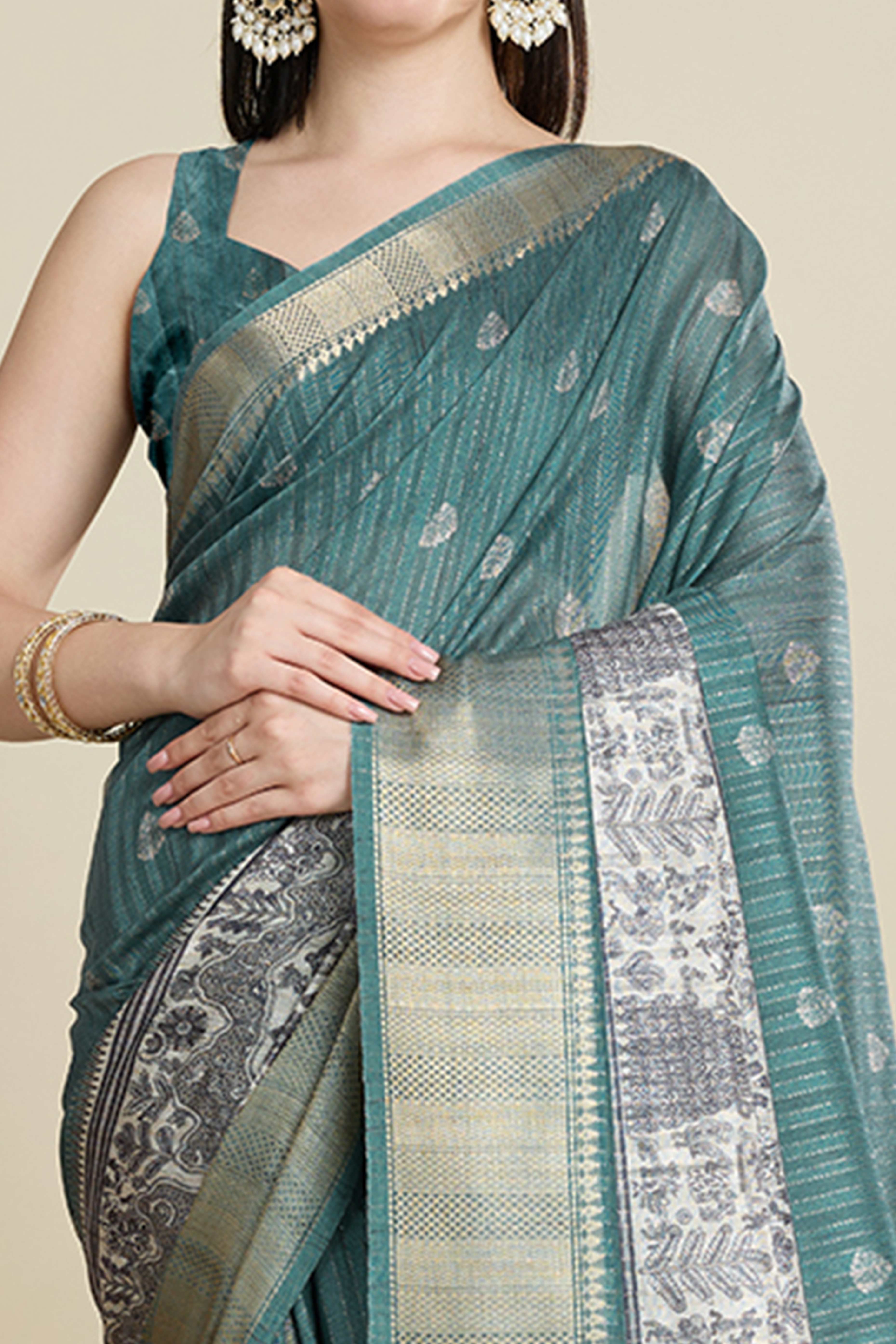 Sea Green Cotton Blend Saree Featuring Floral Prints and a Festive Zari Border Accent