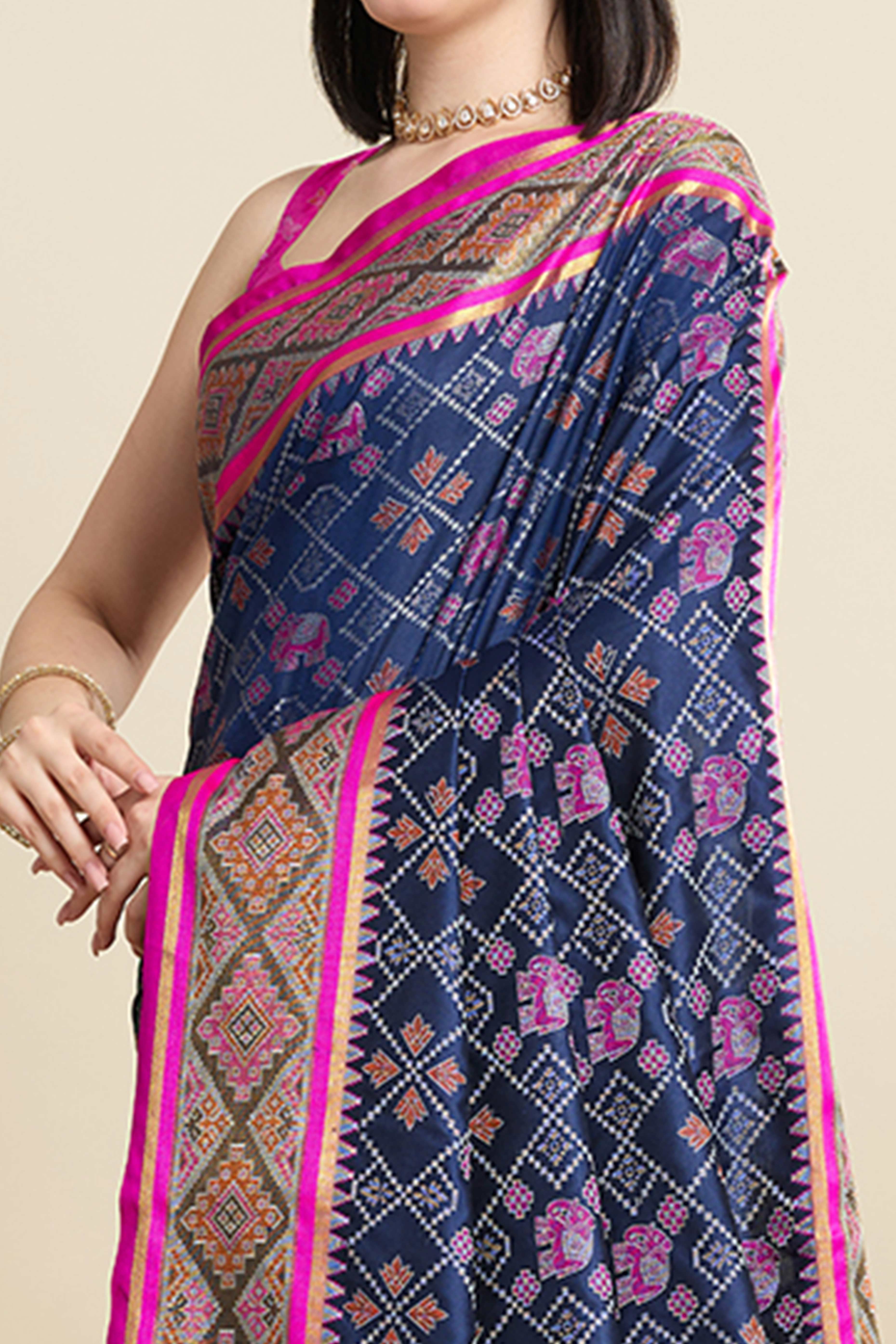 Royal Blue Silk Blend Saree Featuring Patola Prints and a Detailed Weaving Border