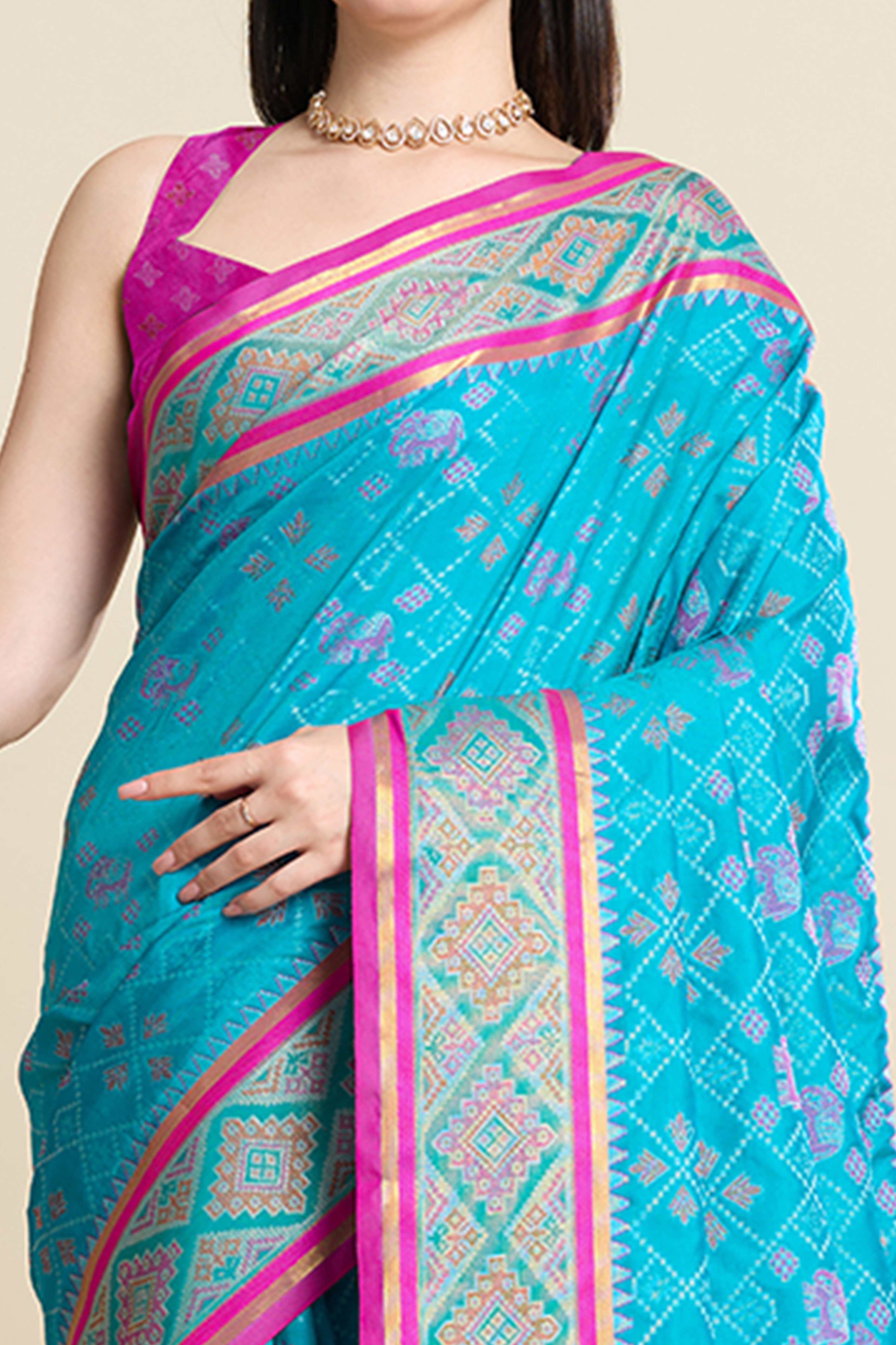Sky Blue Silk Blend Saree Featuring Patola Prints and a Detailed Weaving Border
