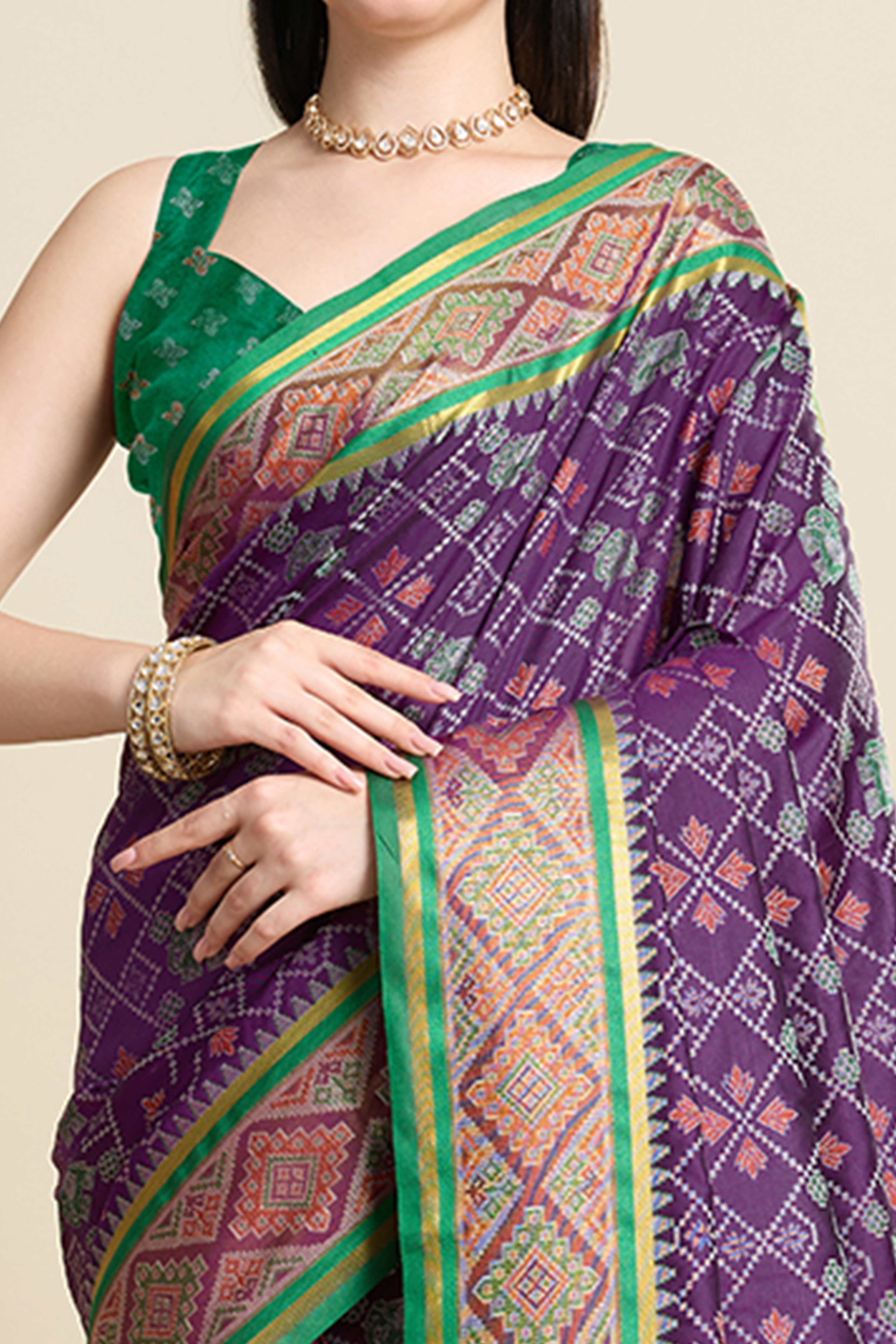 Purple Silk Blend Saree Featuring Patola Prints and a Detailed Weaving Border
