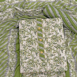 Charming Green Floral Printed Cotton Blend Dress Material Featuring Intricate Lace Border