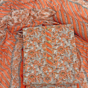 Charming Orange Floral Printed Cotton Blend Dress Material Featuring Intricate Lace Border