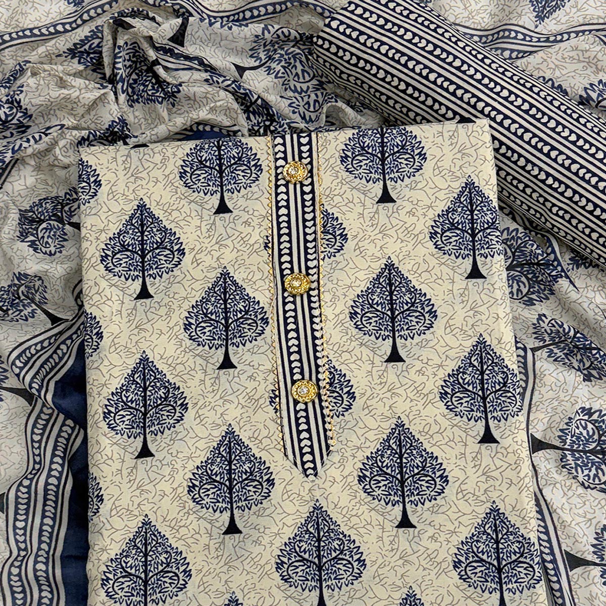 Vibrant Blue Leaf Printed Cotton Blend Dress Material Refined With Lace Border