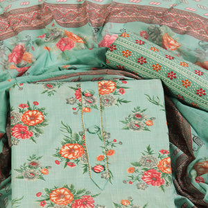 Charming Sea Green Dress Material in Pure Cotton with Subtle Floral Pattern Work